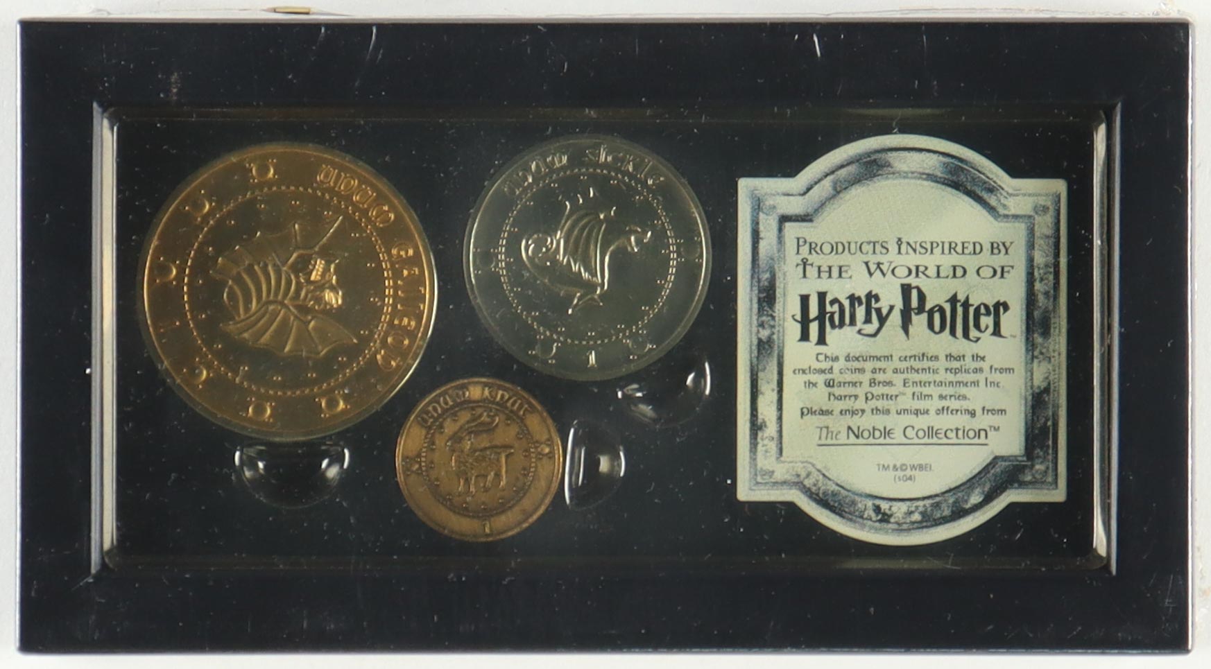 Harry Potter Official Wood Boxed Set of (3) Coins with Warner Brothers COA at PristineAuction.com Harry Potter Official Wood Boxed Set of (3) Coins with Warner Brothers COA at PristineAuction.com