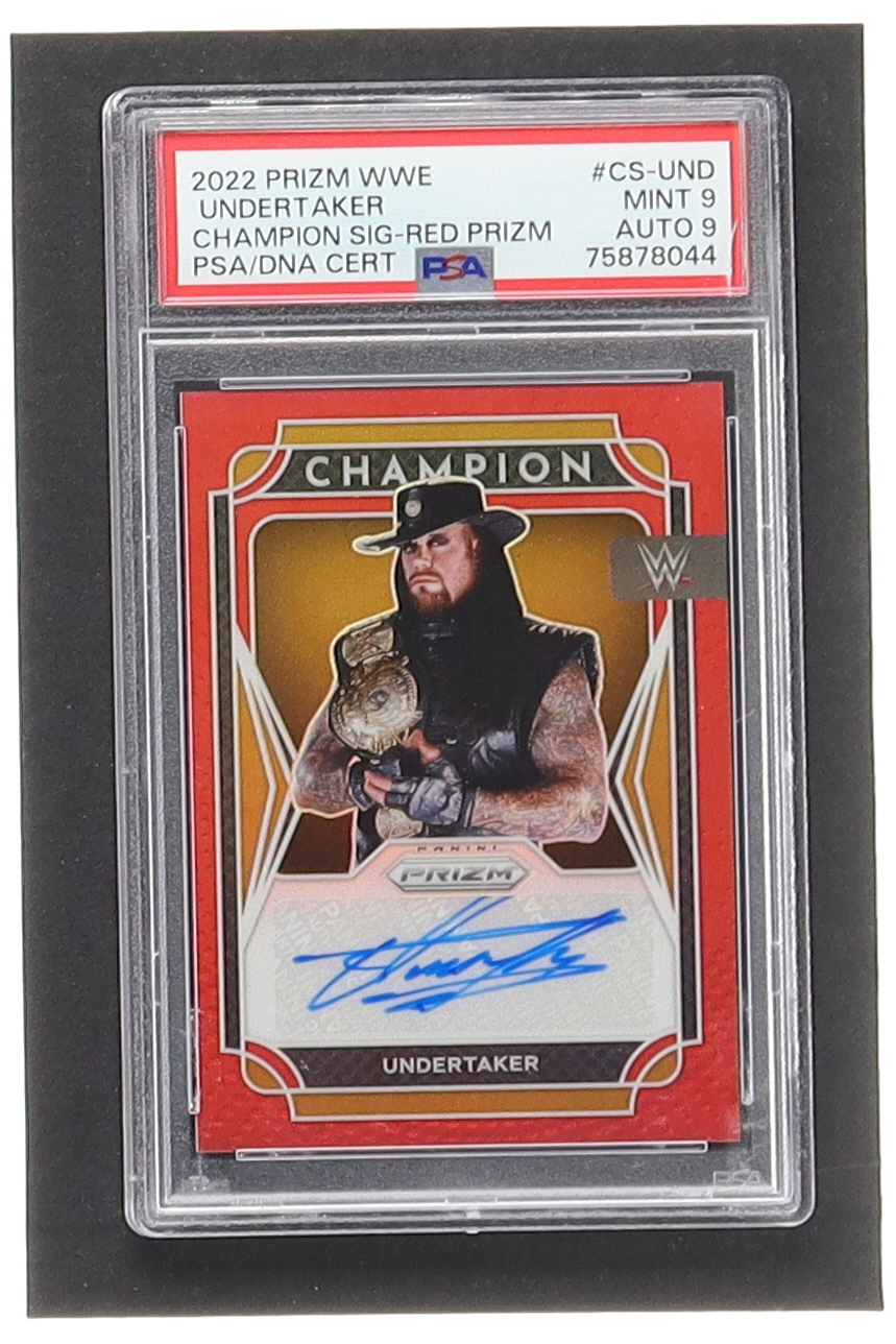 Undertaker 2022 Panini Prizm WWE Champion Signatures Prizms Red #CSUND #92/99 (PSA 9 | Auto Grade 9) at PristineAuction.com Undertaker 2022 Panini Prizm WWE Champion Signatures Prizms Red #CSUND #92/99 (PSA 9 | Auto Grade 9) at PristineAuction.com