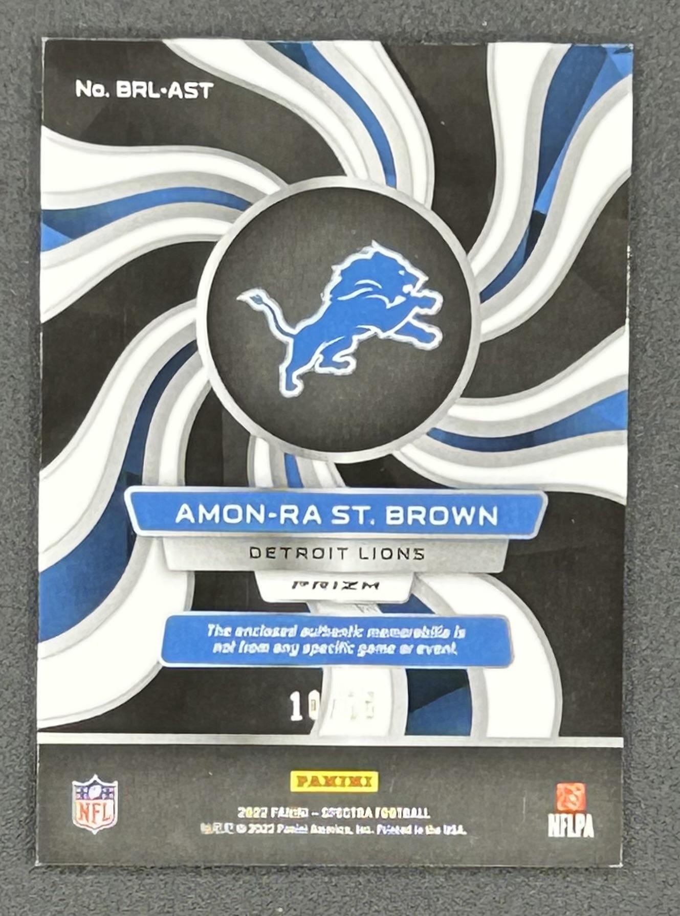 Amon-Ra St. Brown 2022 Panini Spectra Brilliance Materials Neon Pink #23 #10/15 at PristineAuction.com Amon-Ra St. Brown 2022 Panini Spectra Brilliance Materials Neon Pink #23 #10/15 at PristineAuction.com
