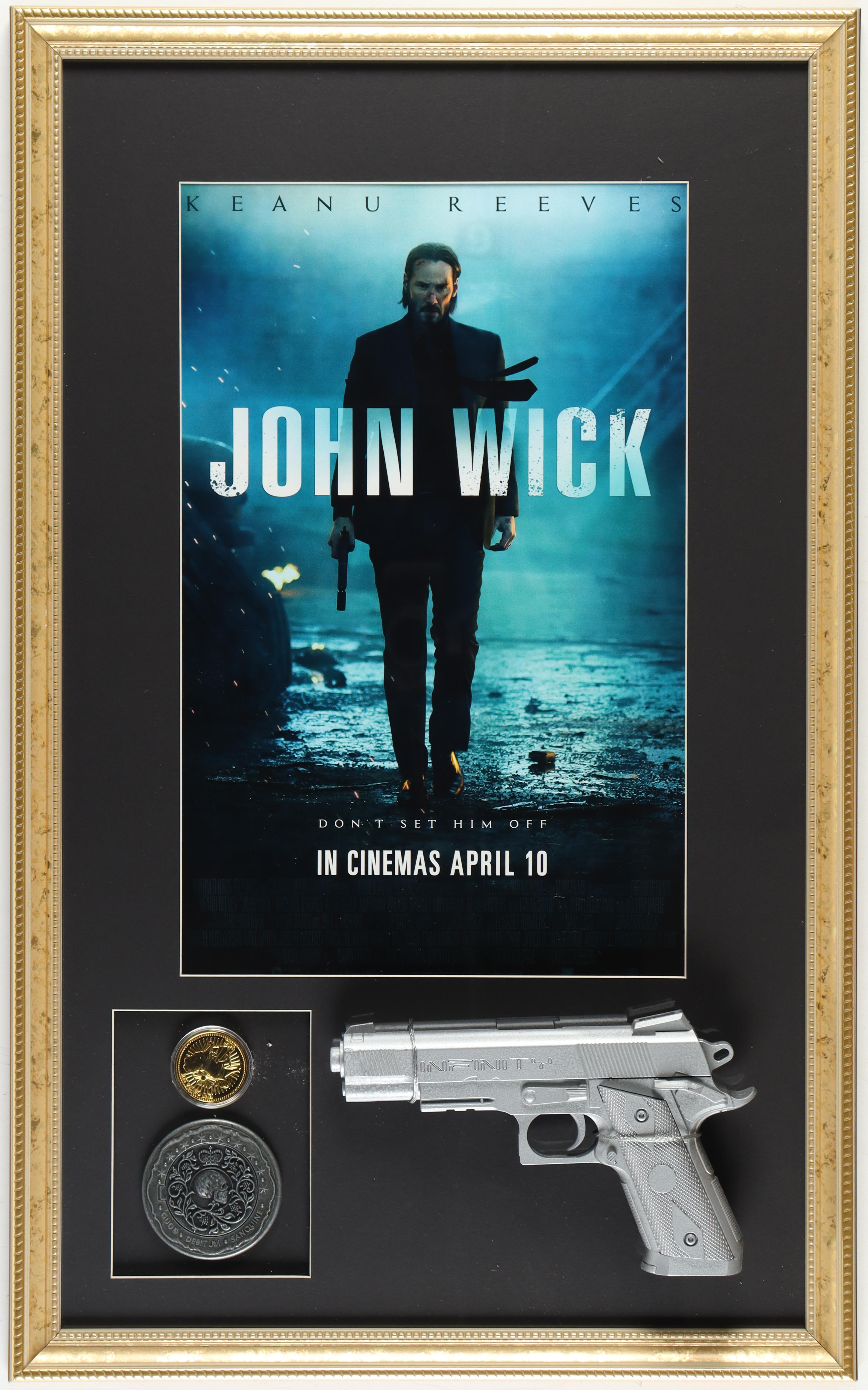 "John Wick" Custom Framed Movie Poster Display with Prop Replica Pistol, Blood Oath Marker & Gold Coin at PristineAuction.com "John Wick" Custom Framed Movie Poster Display with Prop Replica Pistol, Blood Oath Marker & Gold Coin at PristineAuction.com