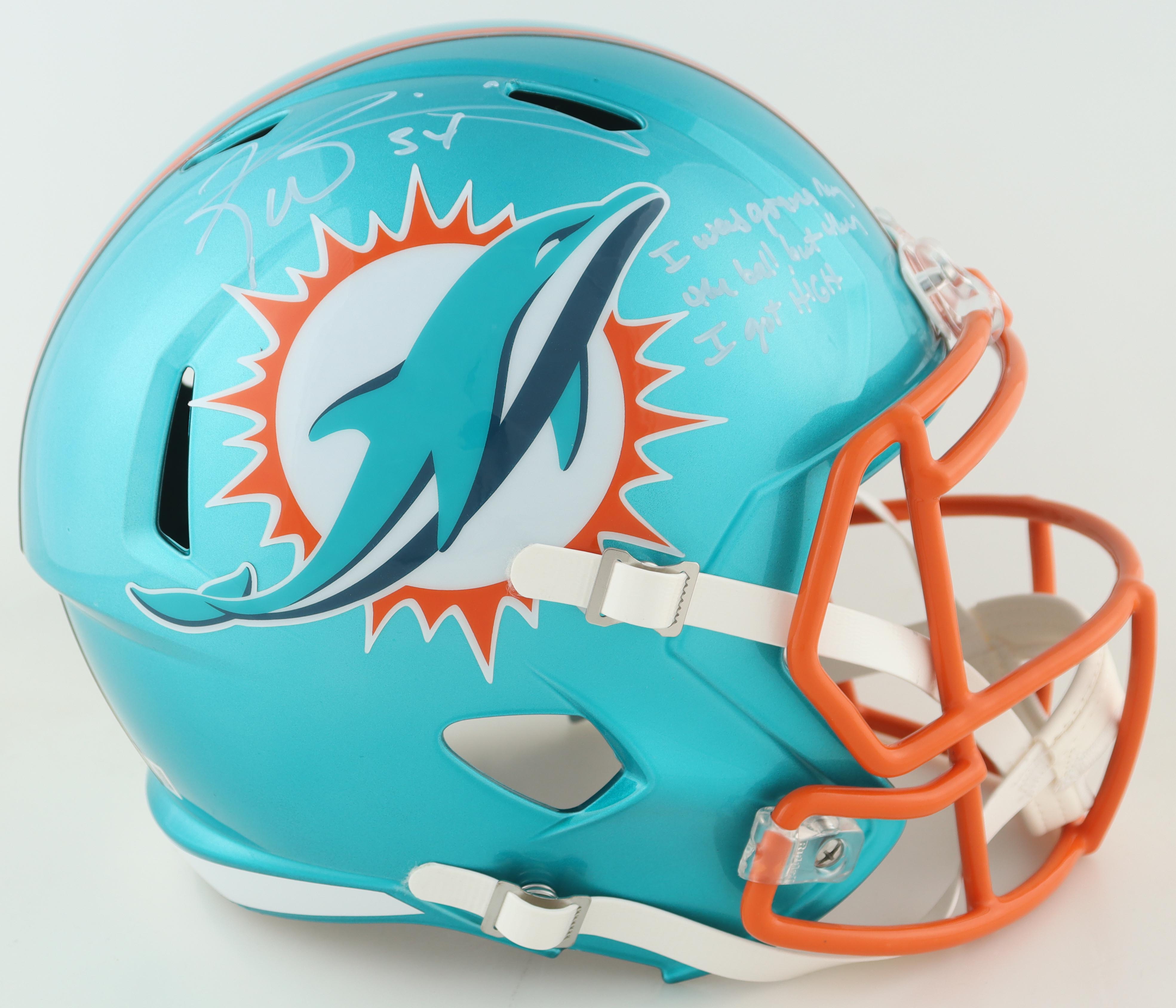 Ricky Williams Signed Dolphins Full-Size Flash Alternate Speed Helmet Inscribed "I Was Gonna Run The Ball, But Then I Got High" (Beckett) at PristineAuction.com Ricky Williams Signed Dolphins Full-Size Flash Alternate Speed Helmet Inscribed "I Was Gonna Run The Ball, But Then I Got High" (Beckett) at PristineAuction.com