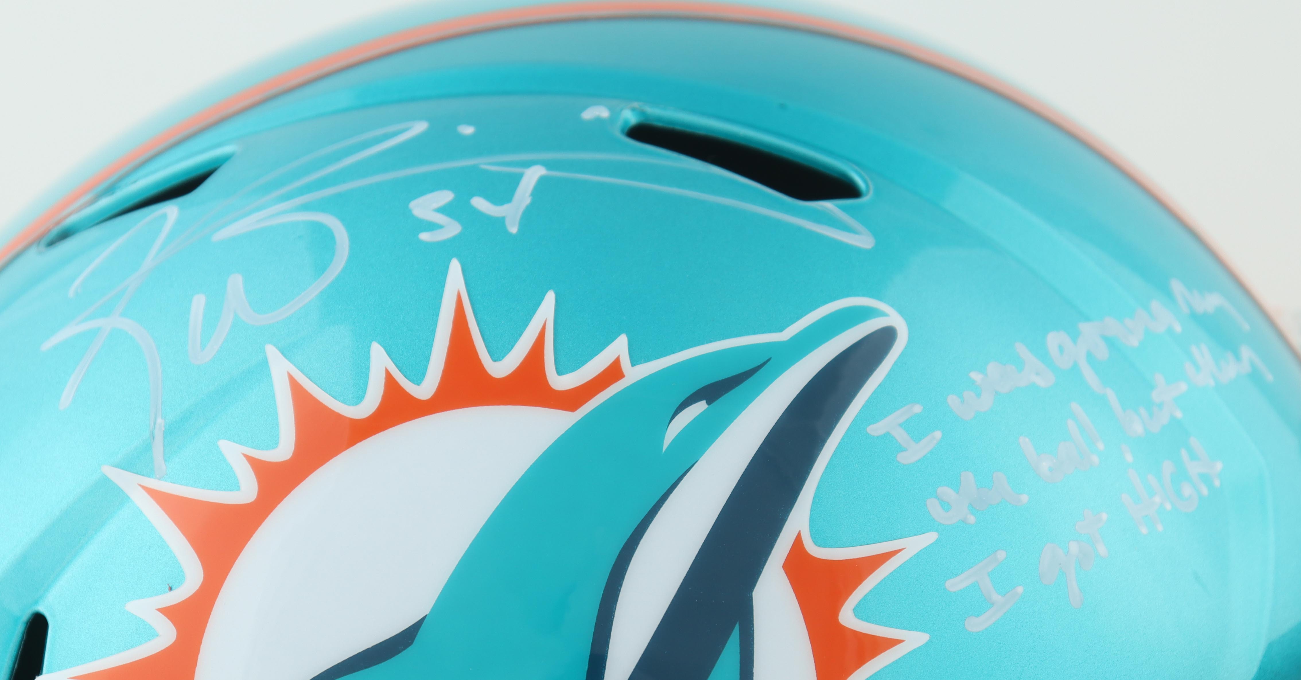 Ricky Williams Signed Dolphins Full-Size Flash Alternate Speed Helmet Inscribed "I Was Gonna Run The Ball, But Then I Got High" (Beckett) at PristineAuction.com Ricky Williams Signed Dolphins Full-Size Flash Alternate Speed Helmet Inscribed "I Was Gonna Run The Ball, But Then I Got High" (Beckett) at PristineAuction.com