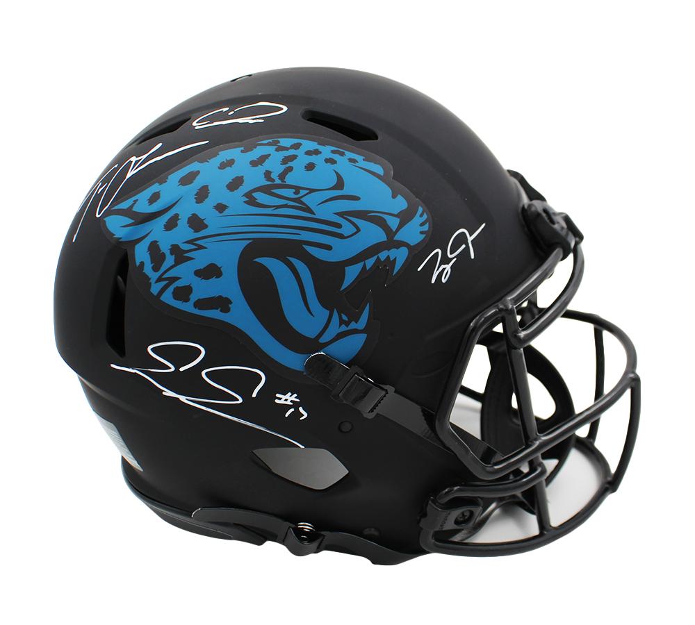 Jaguars Full-Size Authentic On-Field Eclipse Alternate Speed Helmet Signed By (4) with Trevor Lawrence, Calvin Ridley, Evan Engram & Zay Jones (Fanatics & Beckett) at PristineAuction.com Jaguars Full-Size Authentic On-Field Eclipse Alternate Speed Helmet Signed By (4) with Trevor Lawrence, Calvin Ridley, Evan Engram & Zay Jones (Fanatics & Beckett) at PristineAuction.com