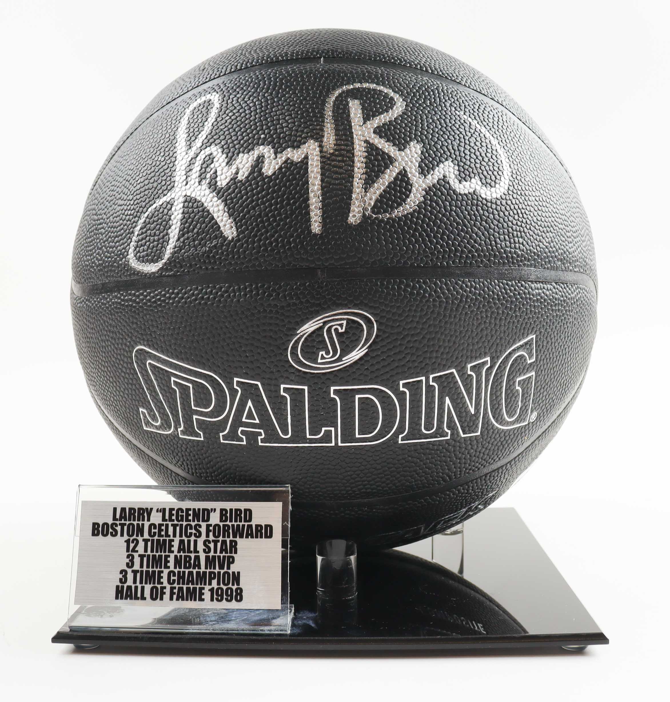Larry Bird Signed Spalding Black Basketball with New Acrylic Basketball Display Stand with Name Plate (Beckett) at PristineAuction.com Larry Bird Signed Spalding Black Basketball with New Acrylic Basketball Display Stand with Name Plate (Beckett) at PristineAuction.com
