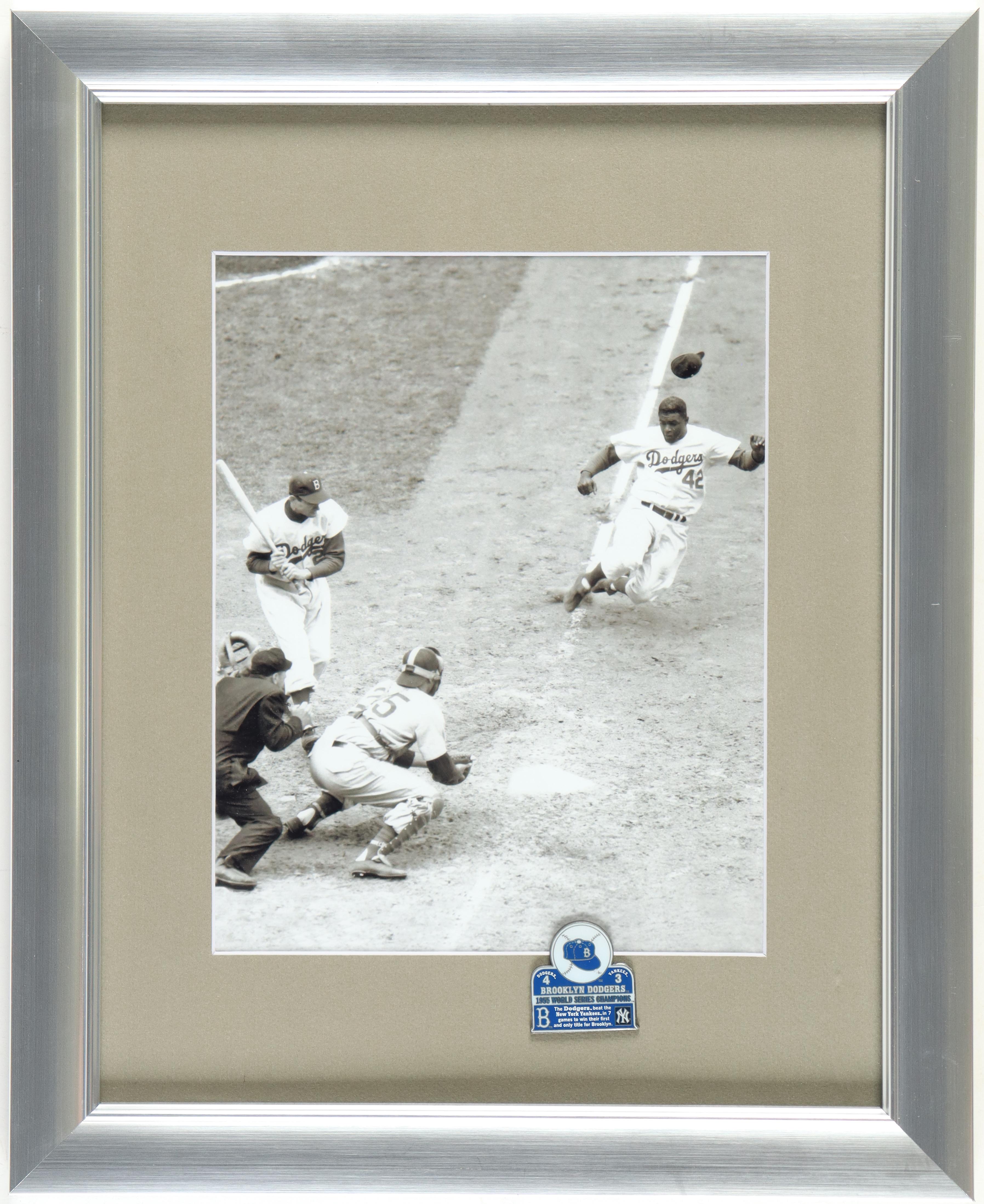 Jackie Robinson Stealing Home 13x16 Custom Framed Black & White Photo with Official 1955 World Series Pin at PristineAuction.com Jackie Robinson Stealing Home 13x16 Custom Framed Black & White Photo with Official 1955 World Series Pin at PristineAuction.com