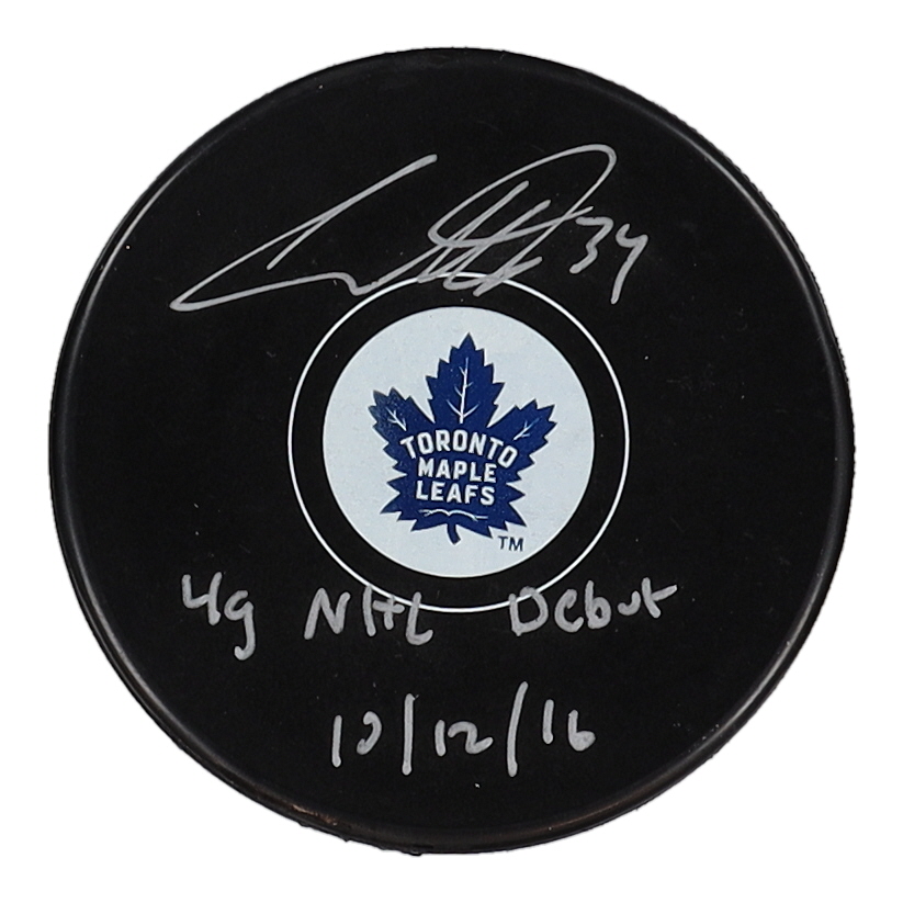 Auston Matthews Signed Maple Leafs Logo Hockey Puck Inscribed "4g NHL Debut 10/12/16" (Fanatics) at PristineAuction.com Auston Matthews Signed Maple Leafs Logo Hockey Puck Inscribed "4g NHL Debut 10/12/16" (Fanatics) at PristineAuction.com