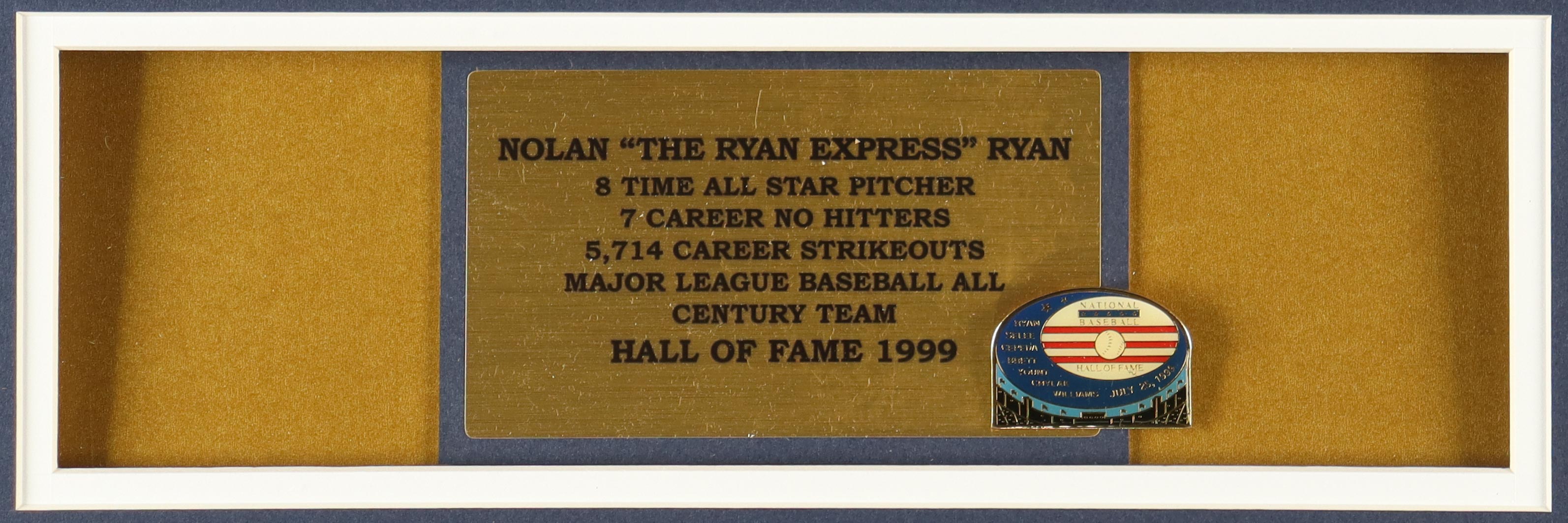 Nolan Ryan Signed Custom Framed Jersey Display With 1999 Hall Of Fame Induction Pin & (2) Metal Logo Embelms Inscribed "324 Wins", "5,714 X's" & "7 No-Hitters" (PSA) at PristineAuction.com Nolan Ryan Signed Custom Framed Jersey Display With 1999 Hall Of Fame Induction Pin & (2) Metal Logo Embelms Inscribed "324 Wins", "5,714 X's" & "7 No-Hitters" (PSA) at PristineAuction.com