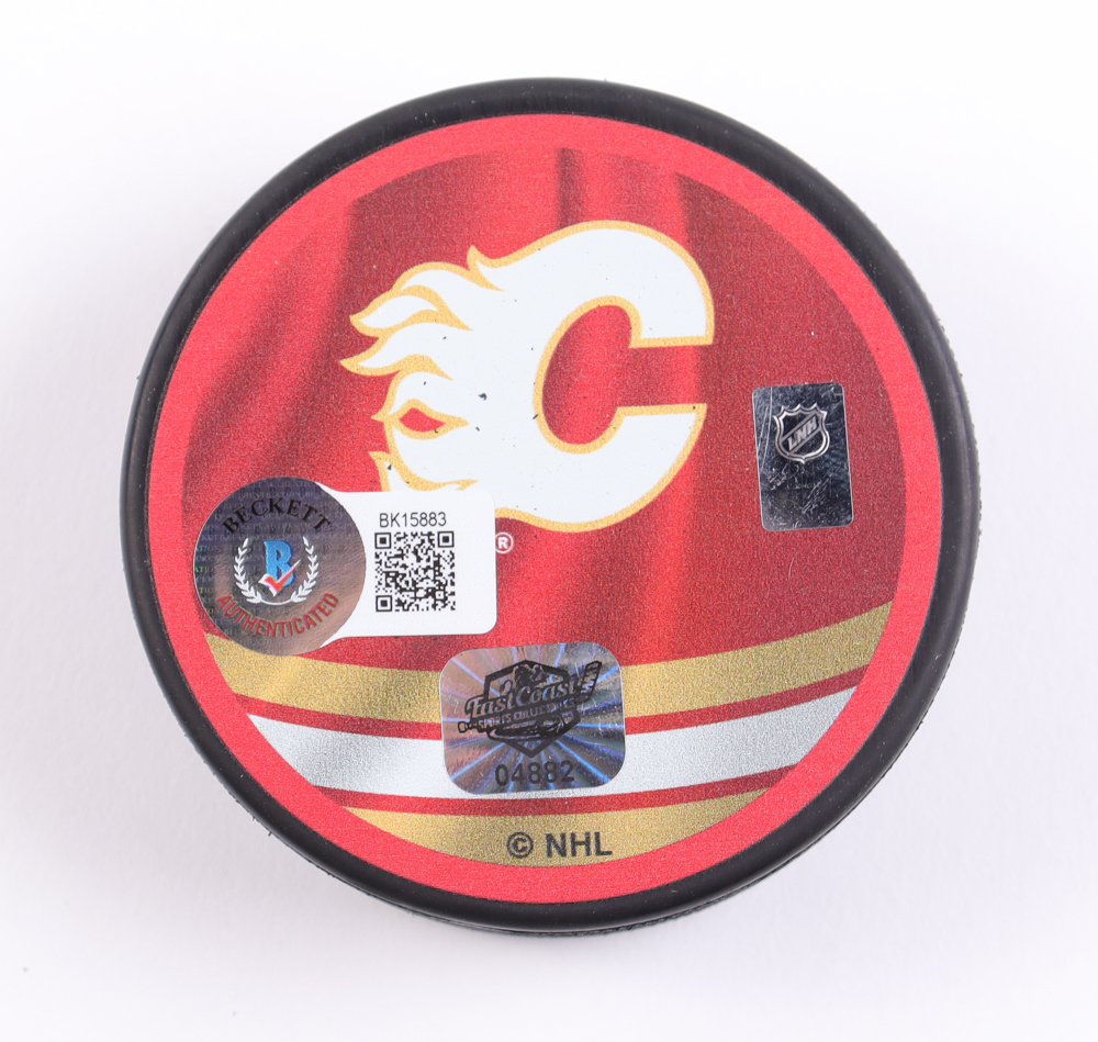 Elias Lindholm Signed Flames Logo Hockey Puck (Beckett) at PristineAuction.com Elias Lindholm Signed Flames Logo Hockey Puck (Beckett) at PristineAuction.com