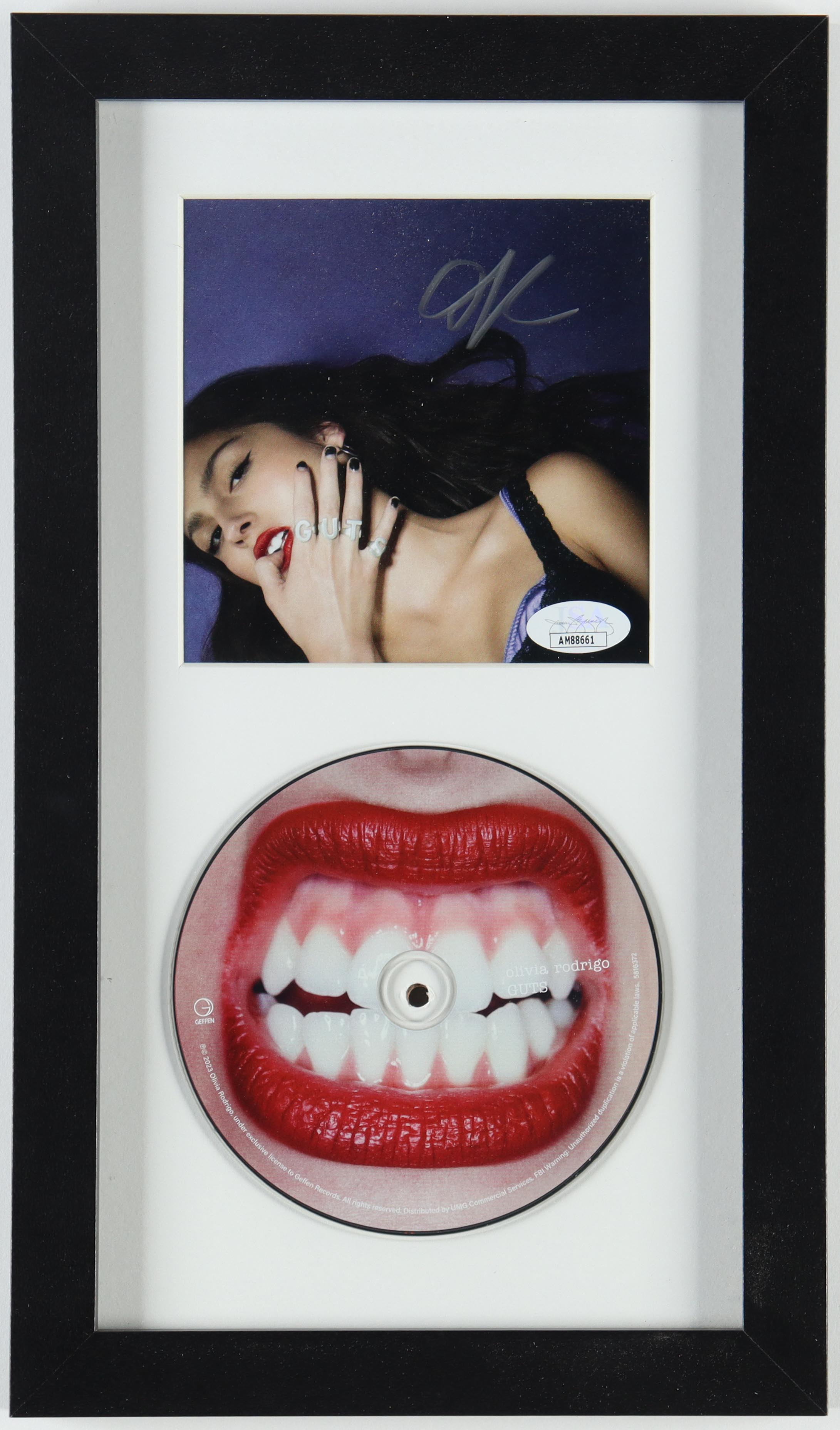Olivia Rodrigo Signed "GUTS" Custom Framed CD Display (JSA) at PristineAuction.com Olivia Rodrigo Signed "GUTS" Custom Framed CD Display (JSA) at PristineAuction.com