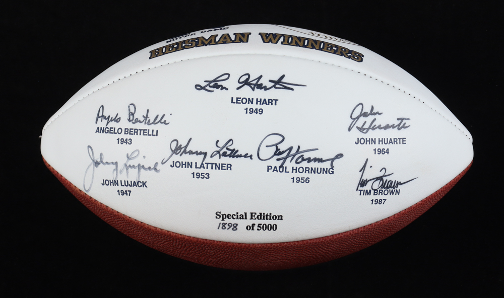 Notre Dame Fighting Irish Heisman Trophy Winners Football Signed by (7) with Leon Hart, Angelo Bertelli, Johnny Lujack, Johnny Lattner (Beckett) at PristineAuction.com Notre Dame Fighting Irish Heisman Trophy Winners Football Signed by (7) with Leon Hart, Angelo Bertelli, Johnny Lujack, Johnny Lattner (Beckett) at PristineAuction.com