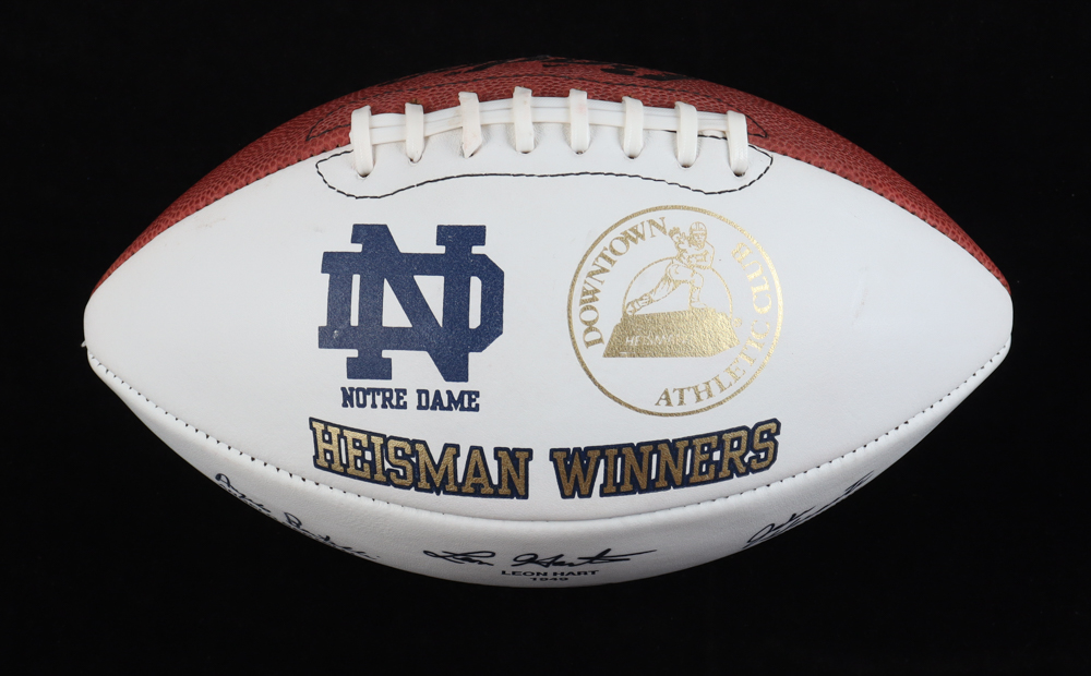 Notre Dame Fighting Irish Heisman Trophy Winners Football Signed by (7) with Leon Hart, Angelo Bertelli, Johnny Lujack, Johnny Lattner (Beckett) at PristineAuction.com Notre Dame Fighting Irish Heisman Trophy Winners Football Signed by (7) with Leon Hart, Angelo Bertelli, Johnny Lujack, Johnny Lattner (Beckett) at PristineAuction.com