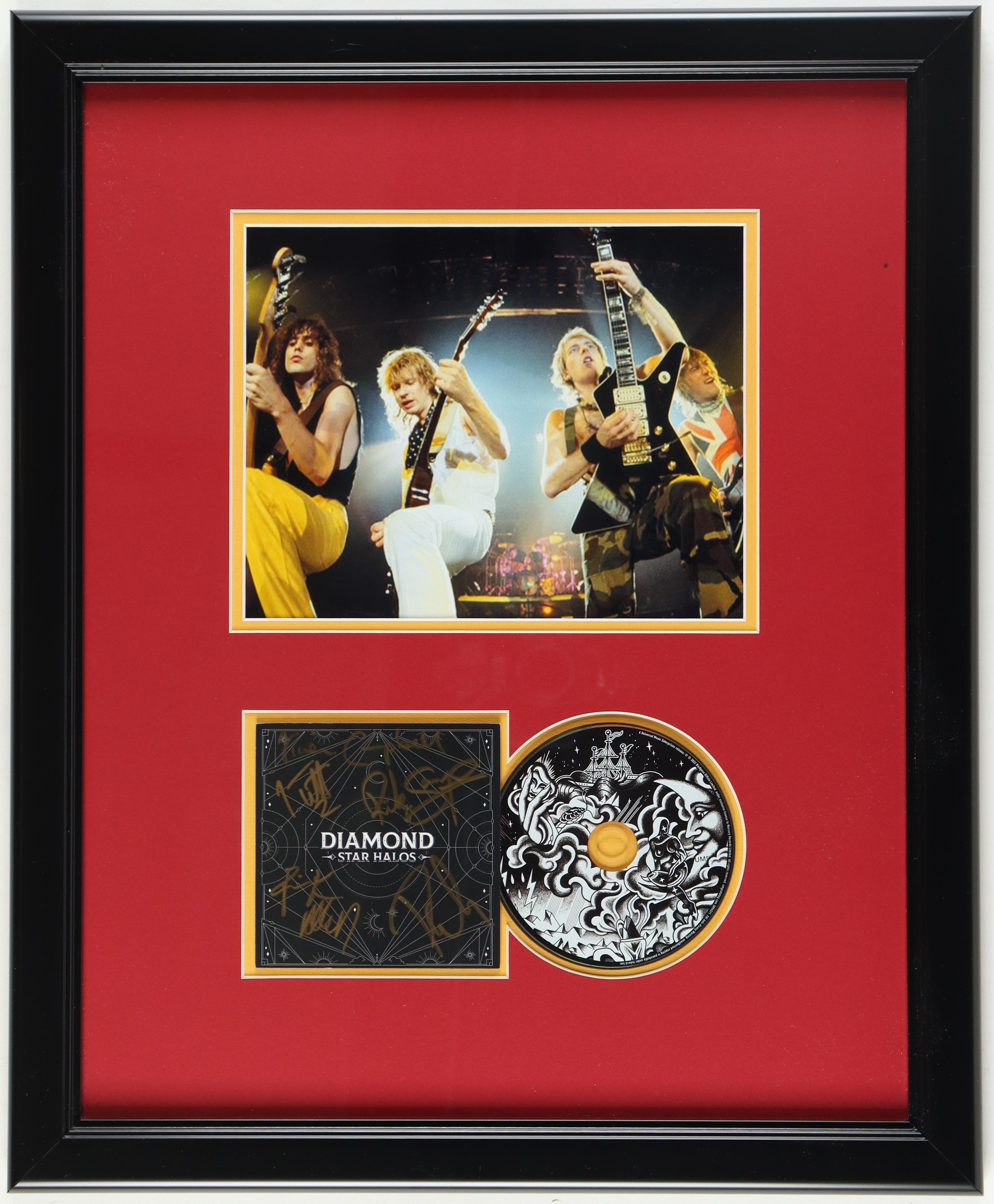 Def Leppard "Diamond Star Halos and Drastic Symphonies" Custom Framed CD Booklet & Disc Display Signed By (5) With Vivian Campbell, Phil Collen, Rick Allen, Joe Elliot (JSA) at PristineAuction.com Def Leppard "Diamond Star Halos and Drastic Symphonies" Custom Framed CD Booklet & Disc Display Signed By (5) With Vivian Campbell, Phil Collen, Rick Allen, Joe Elliot (JSA) at PristineAuction.com