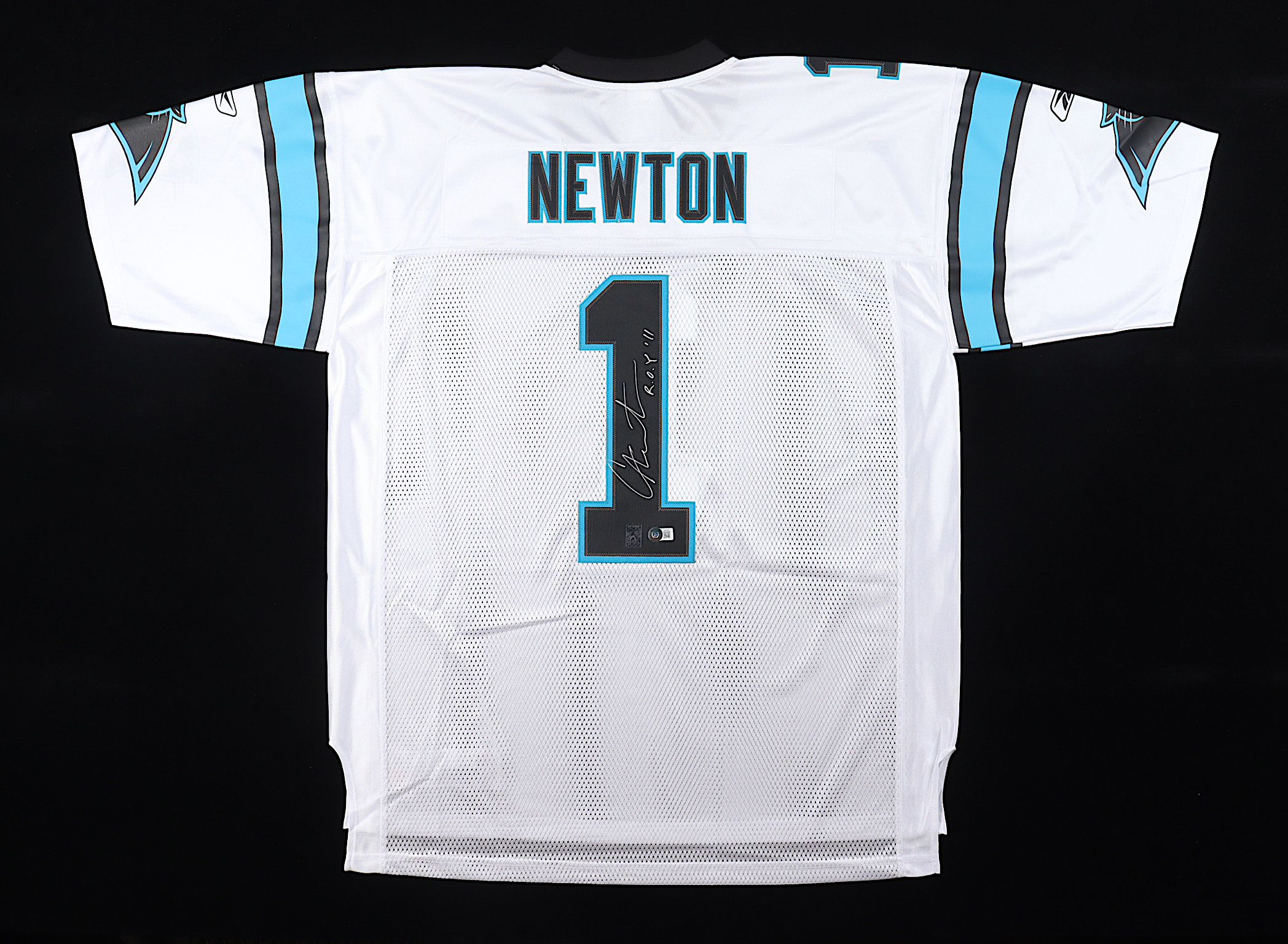 Cam Newton Signed Panthers Jersey Inscribed "R.O.Y. '11" (Beckett & Newton) at PristineAuction.com Cam Newton Signed Panthers Jersey Inscribed "R.O.Y. '11" (Beckett & Newton) at PristineAuction.com