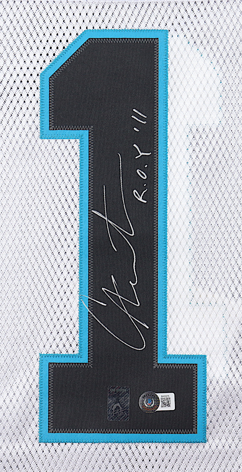 Cam Newton Signed Panthers Jersey Inscribed "R.O.Y. '11" (Beckett & Newton) at PristineAuction.com Cam Newton Signed Panthers Jersey Inscribed "R.O.Y. '11" (Beckett & Newton) at PristineAuction.com