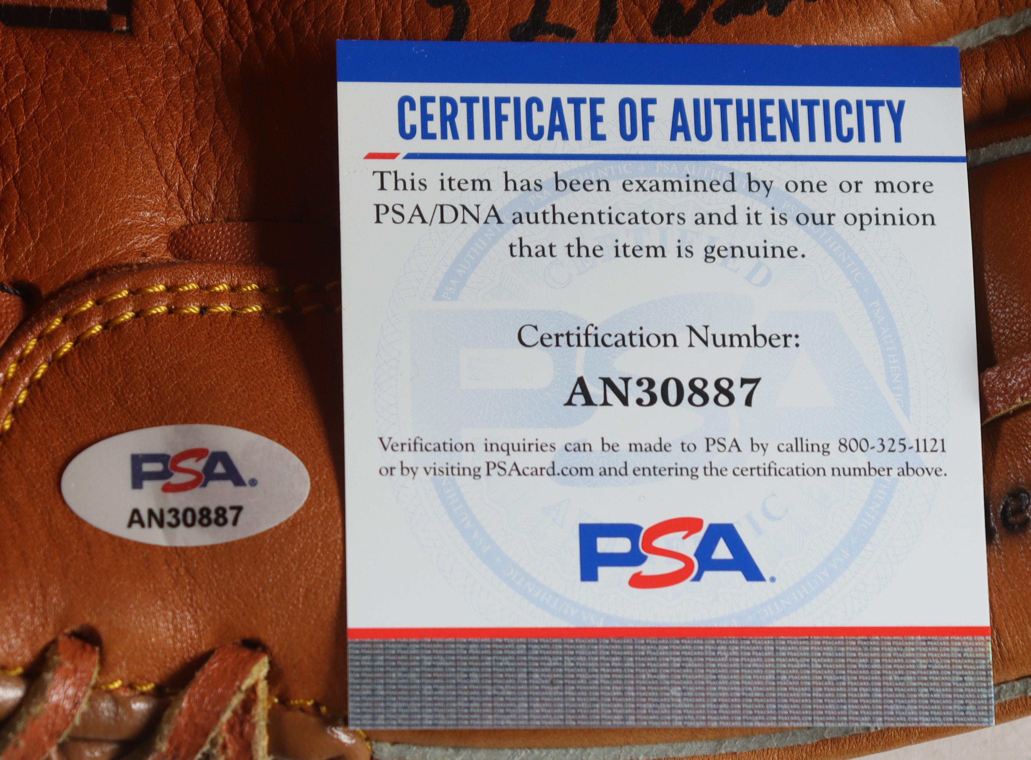 Nolan Ryan Signed Rawlings Baseball Glove With Wood Display Case Inscribed "324 Wins", "5,714 K's" (PSA) at PristineAuction.com Nolan Ryan Signed Rawlings Baseball Glove With Wood Display Case Inscribed "324 Wins", "5,714 K's" (PSA) at PristineAuction.com