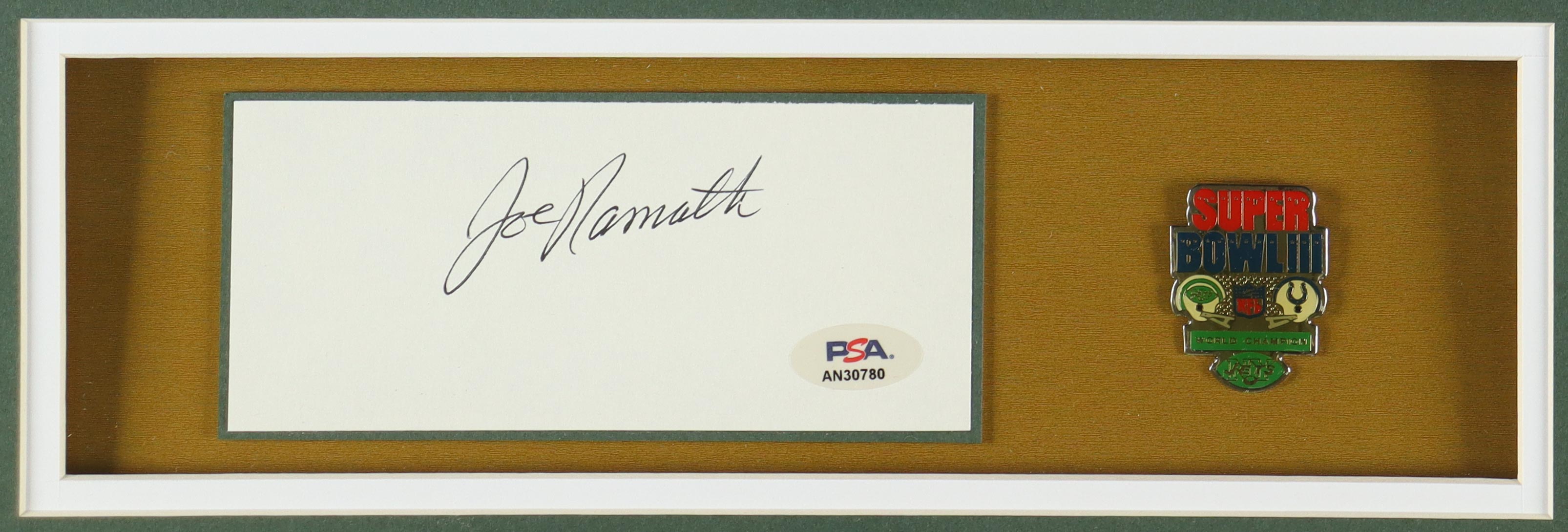 Joe Namath Signed Custom Framed Cut Display With Jersey & Official Super Bowl III Vintage Pin (PSA) at PristineAuction.com Joe Namath Signed Custom Framed Cut Display With Jersey & Official Super Bowl III Vintage Pin (PSA) at PristineAuction.com