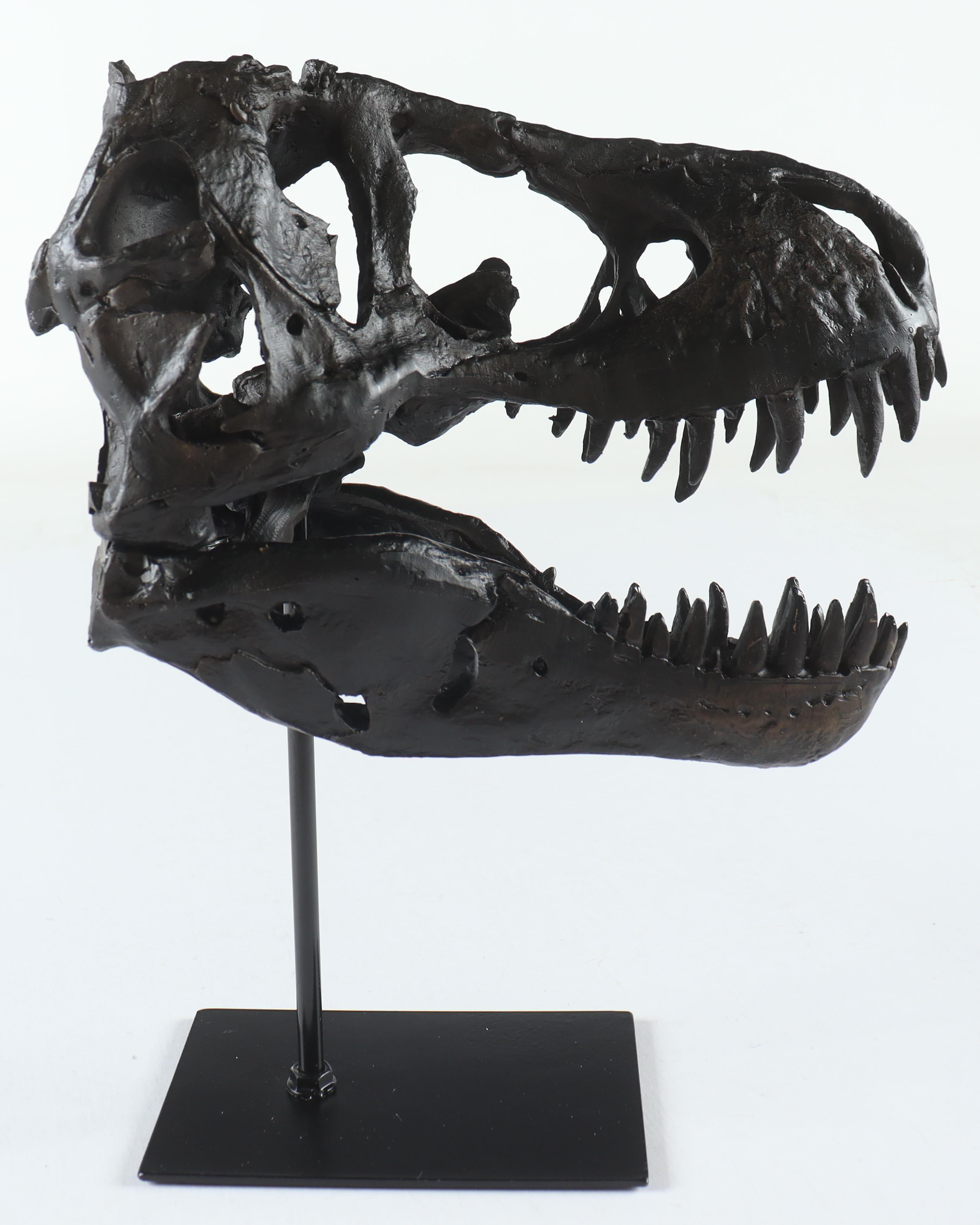 Replica Tyrannosaurus Rex Fossil Skull with Metal Stand Display at PristineAuction.com Replica Tyrannosaurus Rex Fossil Skull with Metal Stand Display at PristineAuction.com