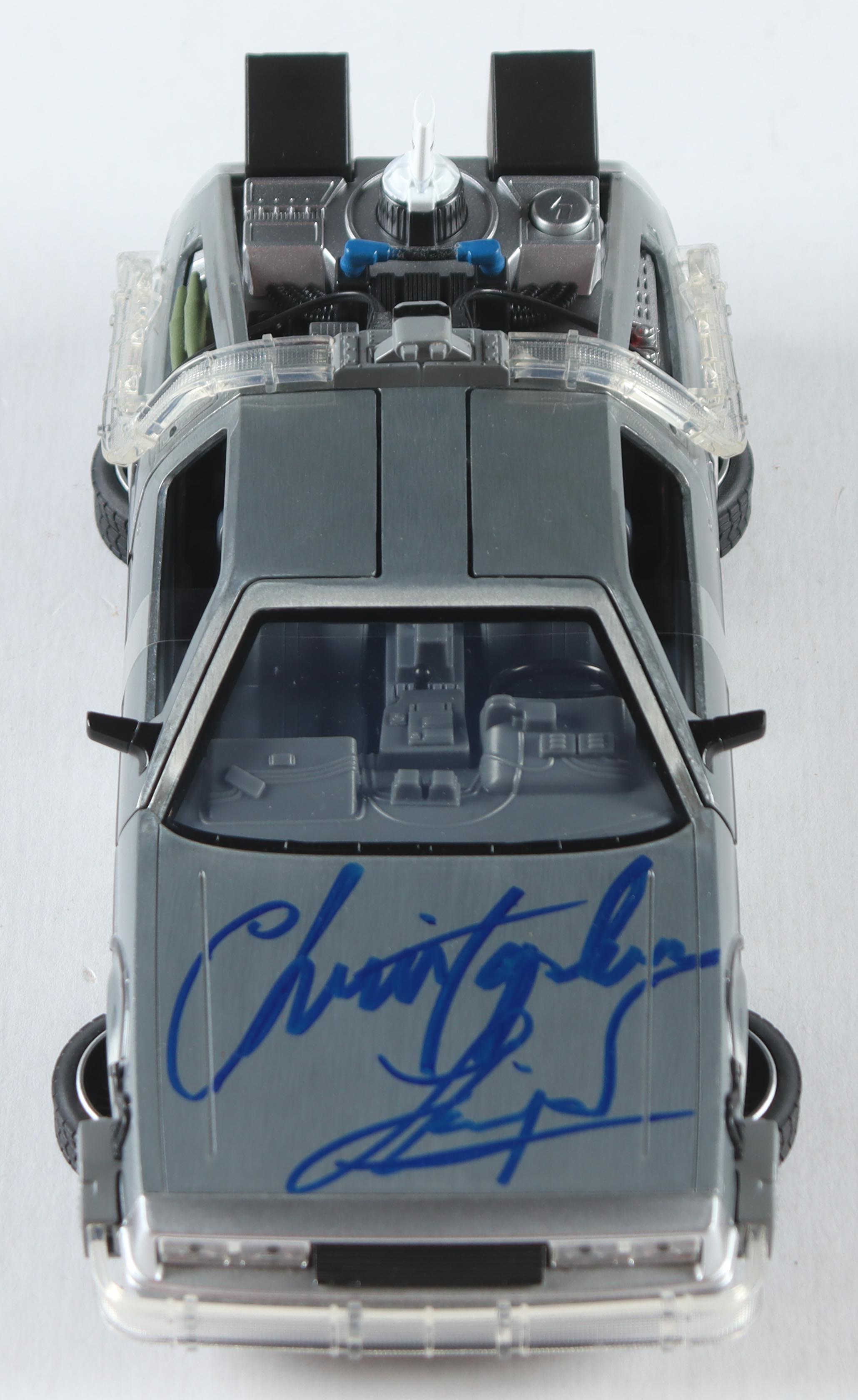 Christopher Lloyd Signed "Back to the Future II" DeLorean Time Machine 1:24 Scale Die-Cast Car With Original Packaging (Beckett) at PristineAuction.com Christopher Lloyd Signed "Back to the Future II" DeLorean Time Machine 1:24 Scale Die-Cast Car With Original Packaging (Beckett) at PristineAuction.com
