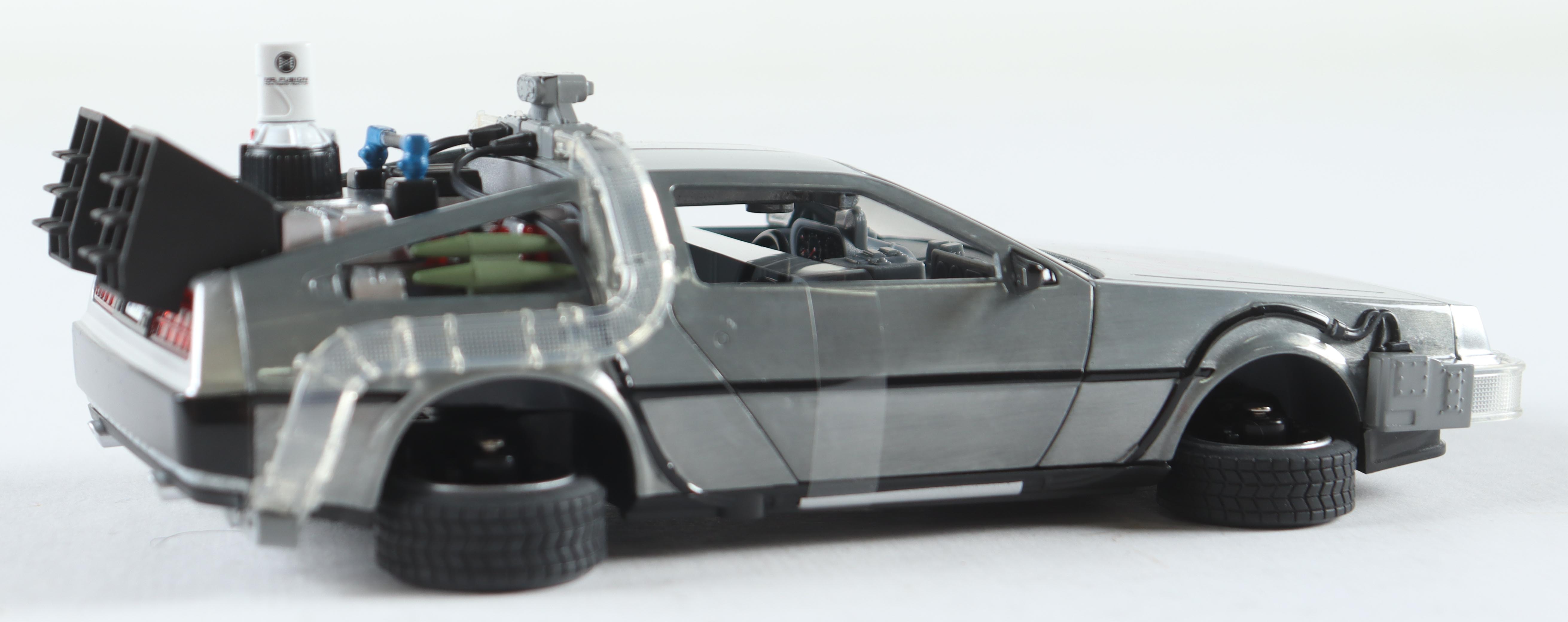 Christopher Lloyd Signed "Back to the Future II" DeLorean Time Machine 1:24 Scale Die-Cast Car With Original Packaging (Beckett) at PristineAuction.com Christopher Lloyd Signed "Back to the Future II" DeLorean Time Machine 1:24 Scale Die-Cast Car With Original Packaging (Beckett) at PristineAuction.com