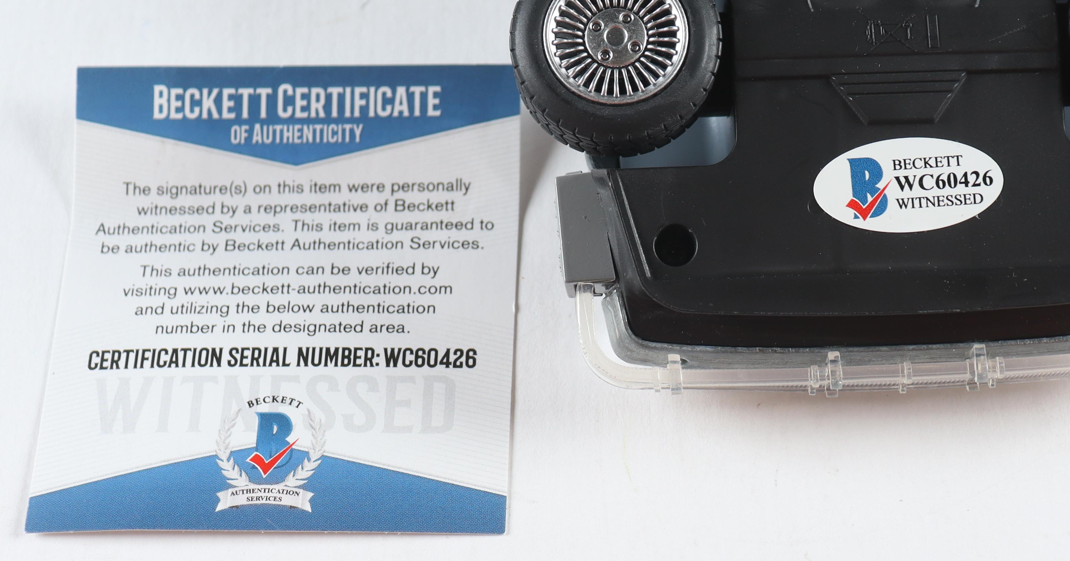 Christopher Lloyd Signed "Back to the Future II" DeLorean Time Machine 1:24 Scale Die-Cast Car With Original Packaging (Beckett) at PristineAuction.com Christopher Lloyd Signed "Back to the Future II" DeLorean Time Machine 1:24 Scale Die-Cast Car With Original Packaging (Beckett) at PristineAuction.com