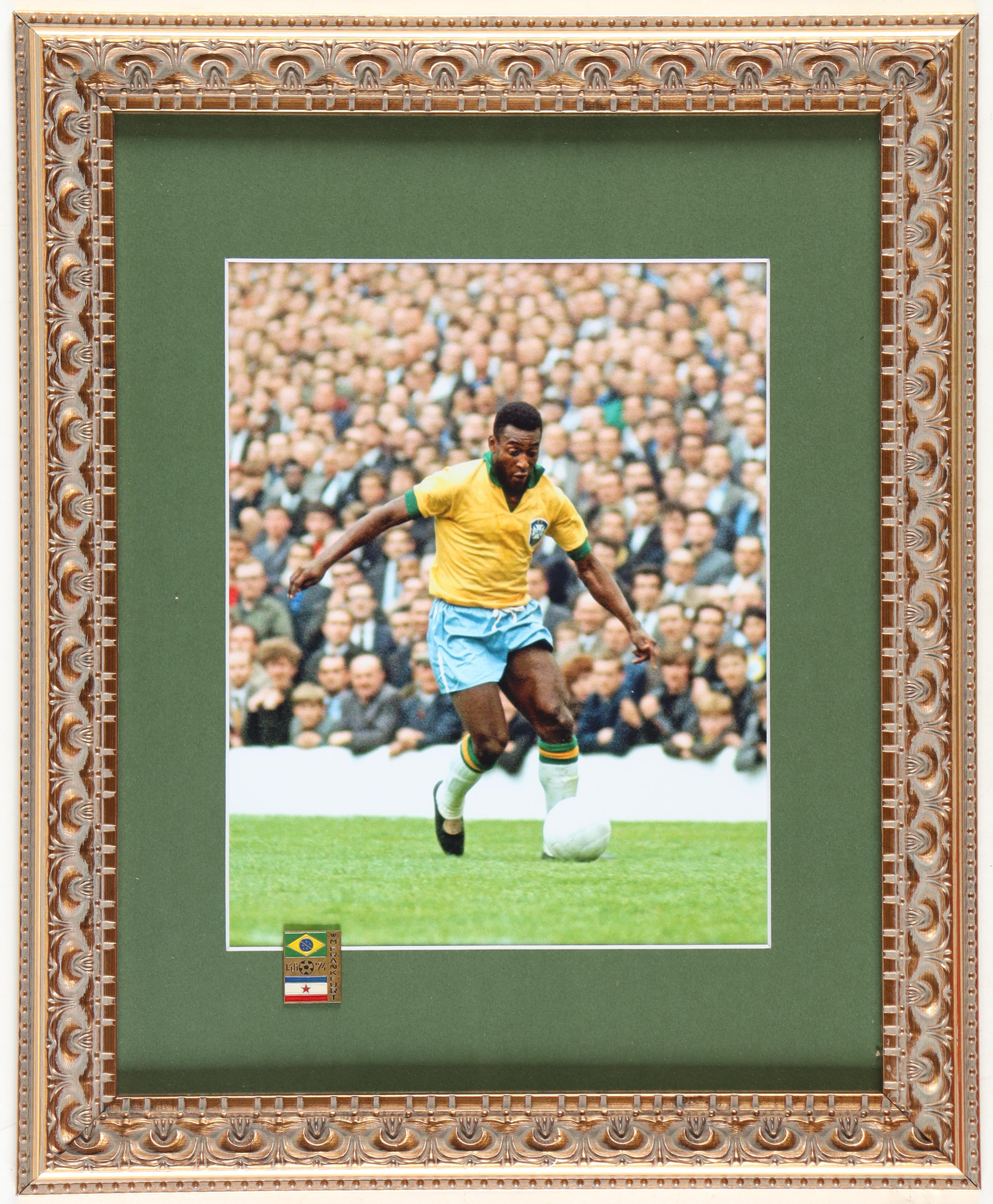 Pele Custom Framed Photo Display With 1974 Brazil World Cup Bronze Pin at PristineAuction.com Pele Custom Framed Photo Display With 1974 Brazil World Cup Bronze Pin at PristineAuction.com