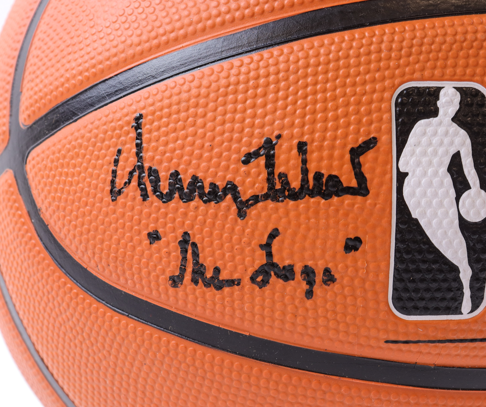 Jerry West Signed Lakers NBA Basketball Inscribed "The Logo" With Display Stand (PSA) at PristineAuction.com Jerry West Signed Lakers NBA Basketball Inscribed "The Logo" With Display Stand (PSA) at PristineAuction.com