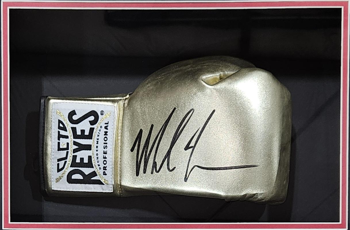 Mike Tyson Signed Gold Cleto Reyes Boxing Glove Shadowbox Display (JSA) at PristineAuction.com Mike Tyson Signed Gold Cleto Reyes Boxing Glove Shadowbox Display (JSA) at PristineAuction.com