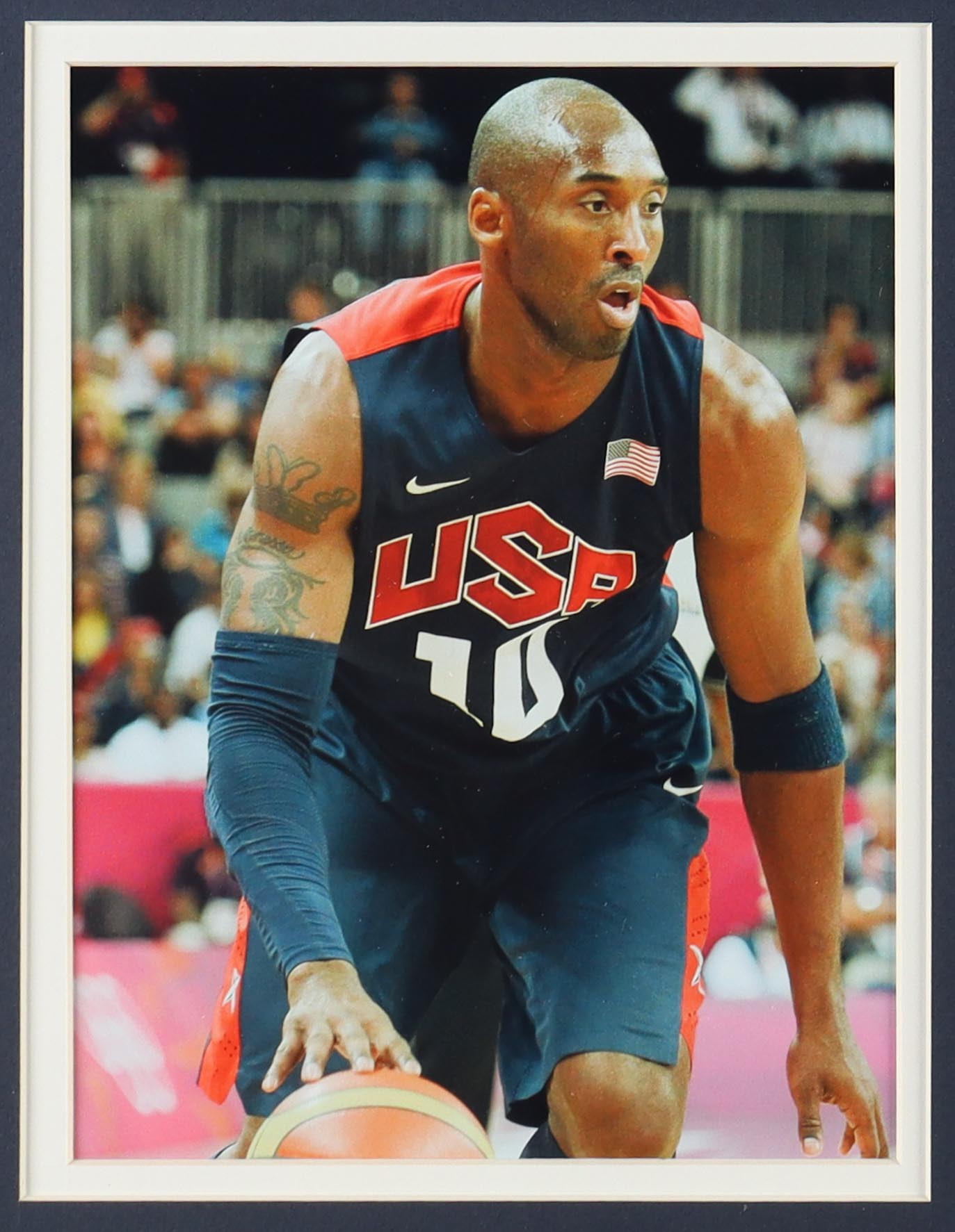 Kobe Bryant Team USA Custom Framed Nike Jersey Display with (2) Vintage USA Basketball Pins & (2) Cloth Patches at PristineAuction.com Kobe Bryant Team USA Custom Framed Nike Jersey Display with (2) Vintage USA Basketball Pins & (2) Cloth Patches at PristineAuction.com