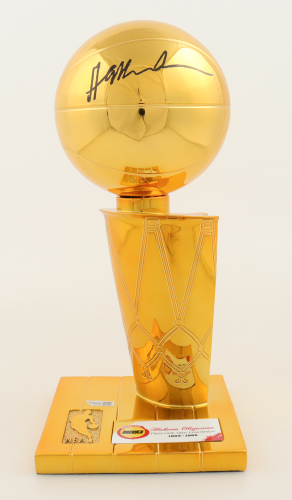 Hakeem Olajuwon Signed Rockets 1994-1995 NBA Champions 12" Replica Trophy (Fanatics) at PristineAuction.com Hakeem Olajuwon Signed Rockets 1994-1995 NBA Champions 12" Replica Trophy (Fanatics) at PristineAuction.com