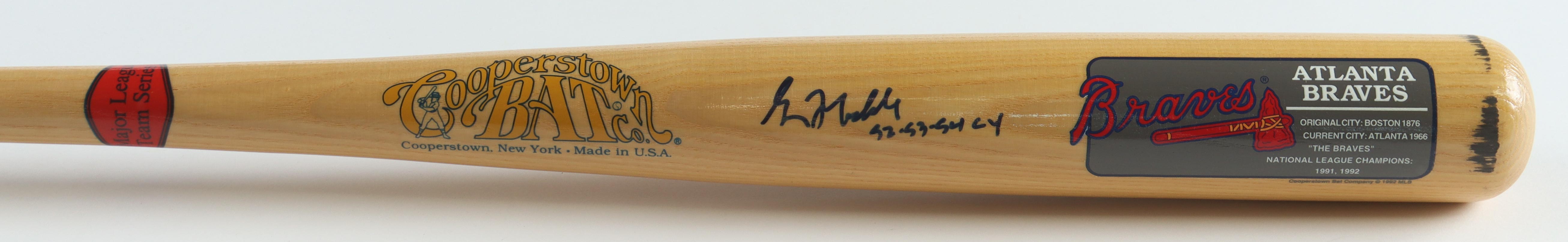 Greg Maddux Signed Cooperstown Baseball Bat Inscribed "92-93-94 CY" (PSA) at PristineAuction.com Greg Maddux Signed Cooperstown Baseball Bat Inscribed "92-93-94 CY" (PSA) at PristineAuction.com