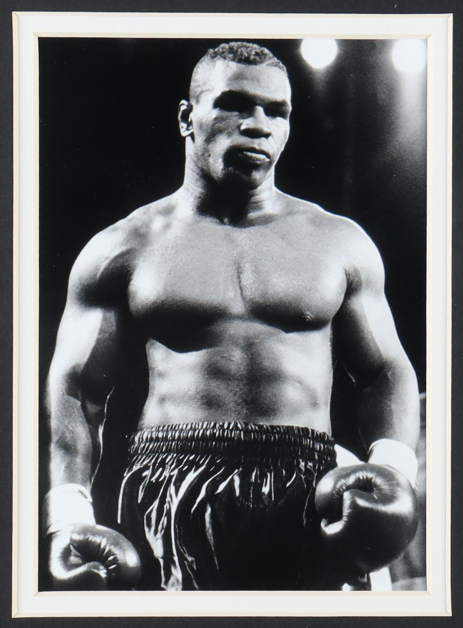 Mike Tyson Signed Custom Framed Boxing Trunks Display (Tyson & JSA) at PristineAuction.com Mike Tyson Signed Custom Framed Boxing Trunks Display (Tyson & JSA) at PristineAuction.com