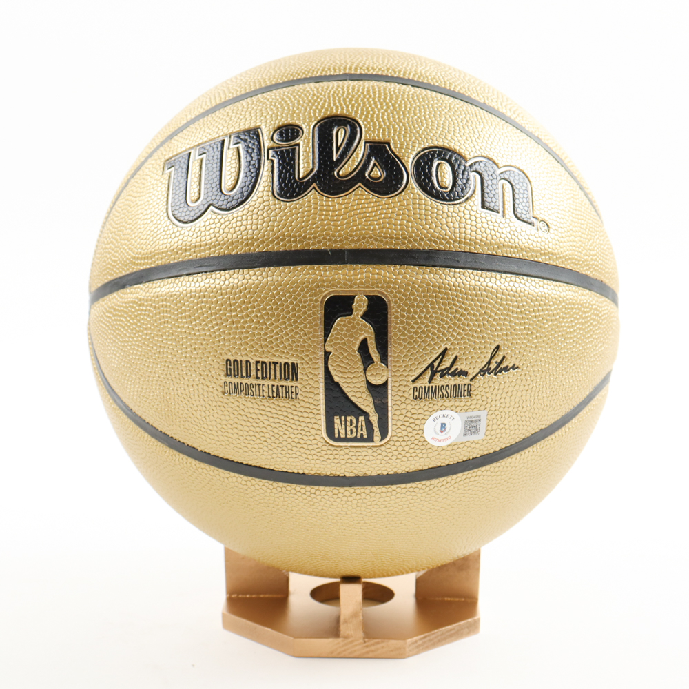 Magic Johnson & Jerry West Signed Special Gold Edition NBA Basketball with All-Wood Stand Inscribed "The Logo" (Beckett) at PristineAuction.com Magic Johnson & Jerry West Signed Special Gold Edition NBA Basketball with All-Wood Stand Inscribed "The Logo" (Beckett) at PristineAuction.com