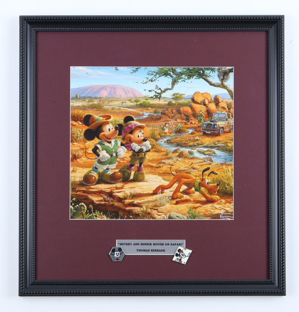 Thomas Kinkade "Mickey and Minnie on Safari" Custom Framed Print Display with Set of (2) Vintage Disney Mickey & Minnie Mouse Pins at PristineAuction.com Thomas Kinkade "Mickey and Minnie on Safari" Custom Framed Print Display with Set of (2) Vintage Disney Mickey & Minnie Mouse Pins at PristineAuction.com
