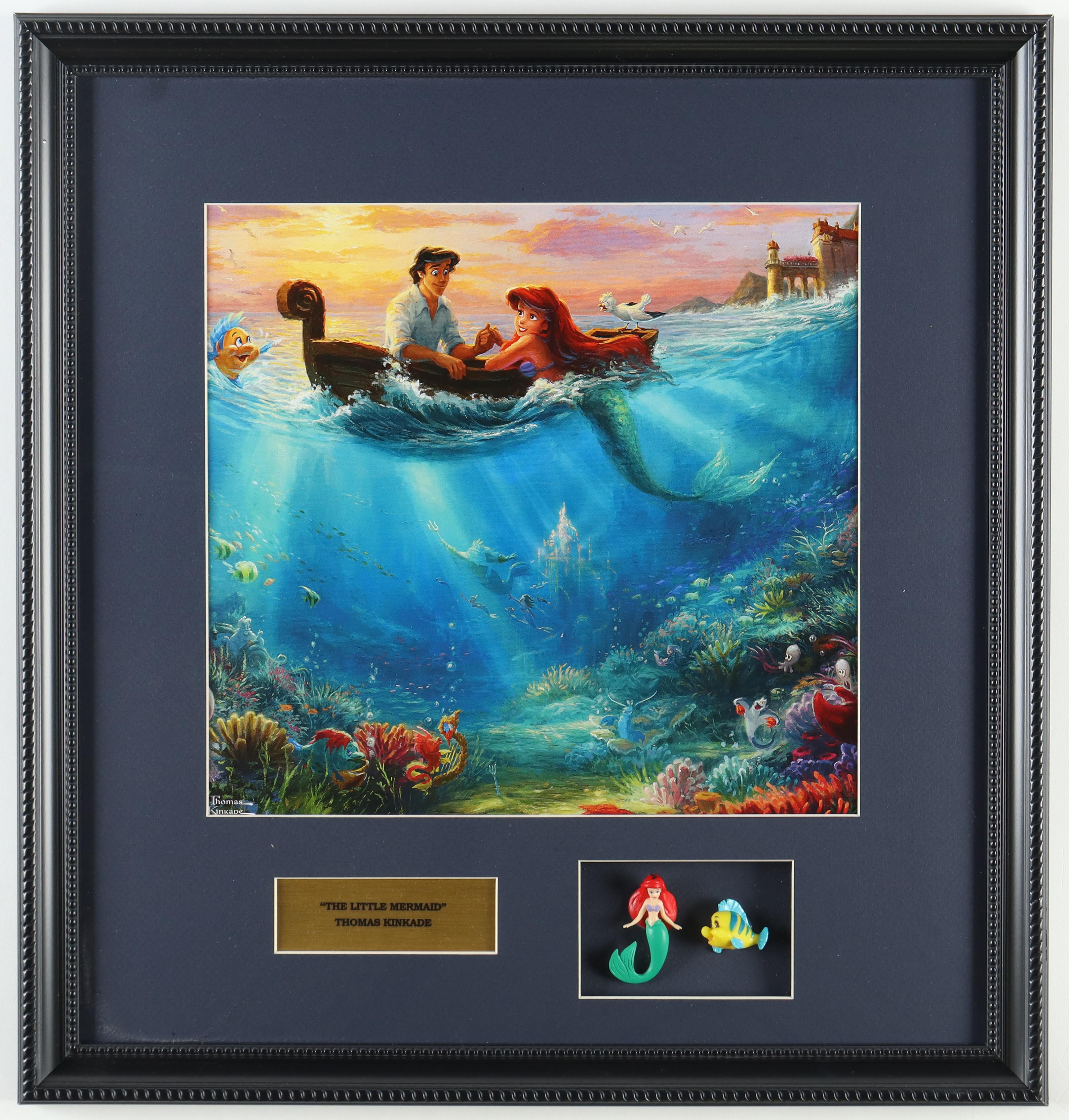 Thomas Kinkade "The Little Mermaid" Custom Framed Print Display With Set of (2) Vintage Disney Ariel & Flounder Movie Figures at PristineAuction.com Thomas Kinkade "The Little Mermaid" Custom Framed Print Display With Set of (2) Vintage Disney Ariel & Flounder Movie Figures at PristineAuction.com