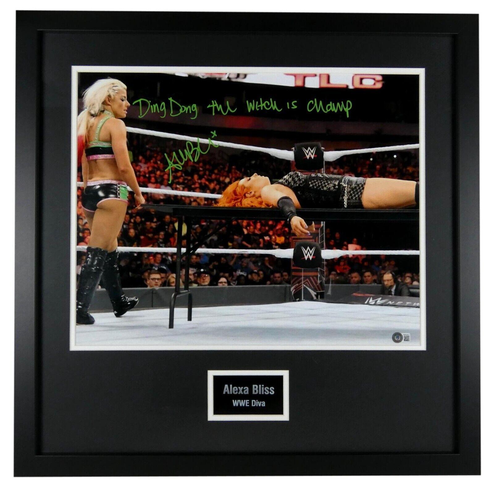Alexa Bliss Signed WWE Custom Framed Photo Display Inscribed "Ding Dong the Witch is Champ" (Beckett) at PristineAuction.com Alexa Bliss Signed WWE Custom Framed Photo Display Inscribed "Ding Dong the Witch is Champ" (Beckett) at PristineAuction.com