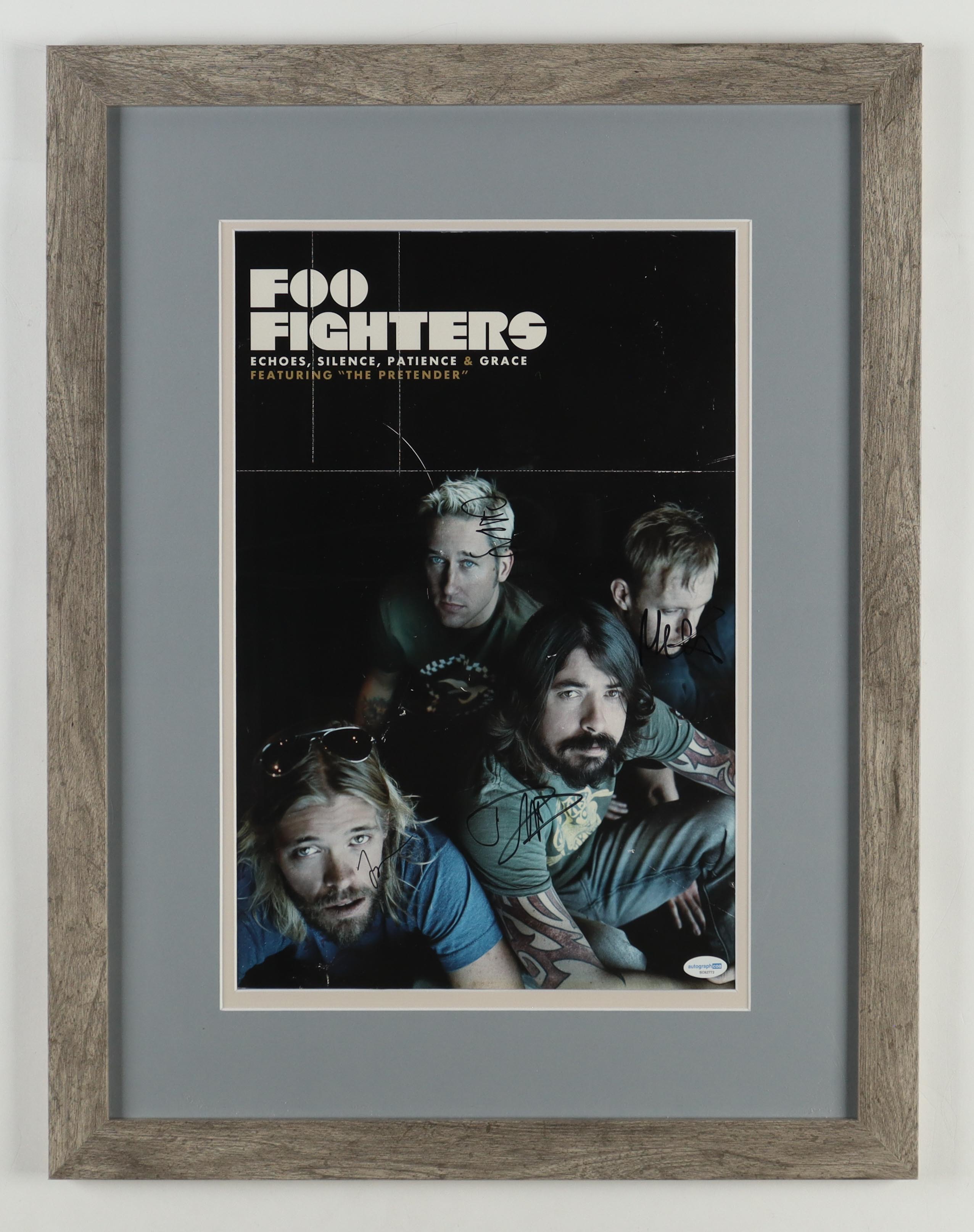 Foo Fighters Custom Framed Photo Display Band-Signed By (4) with Taylor Hawkins, Dave Grohl, Chris Shiflett, Nate Mendel (AutographCOA) at PristineAuction.com Foo Fighters Custom Framed Photo Display Band-Signed By (4) with Taylor Hawkins, Dave Grohl, Chris Shiflett, Nate Mendel (AutographCOA) at PristineAuction.com