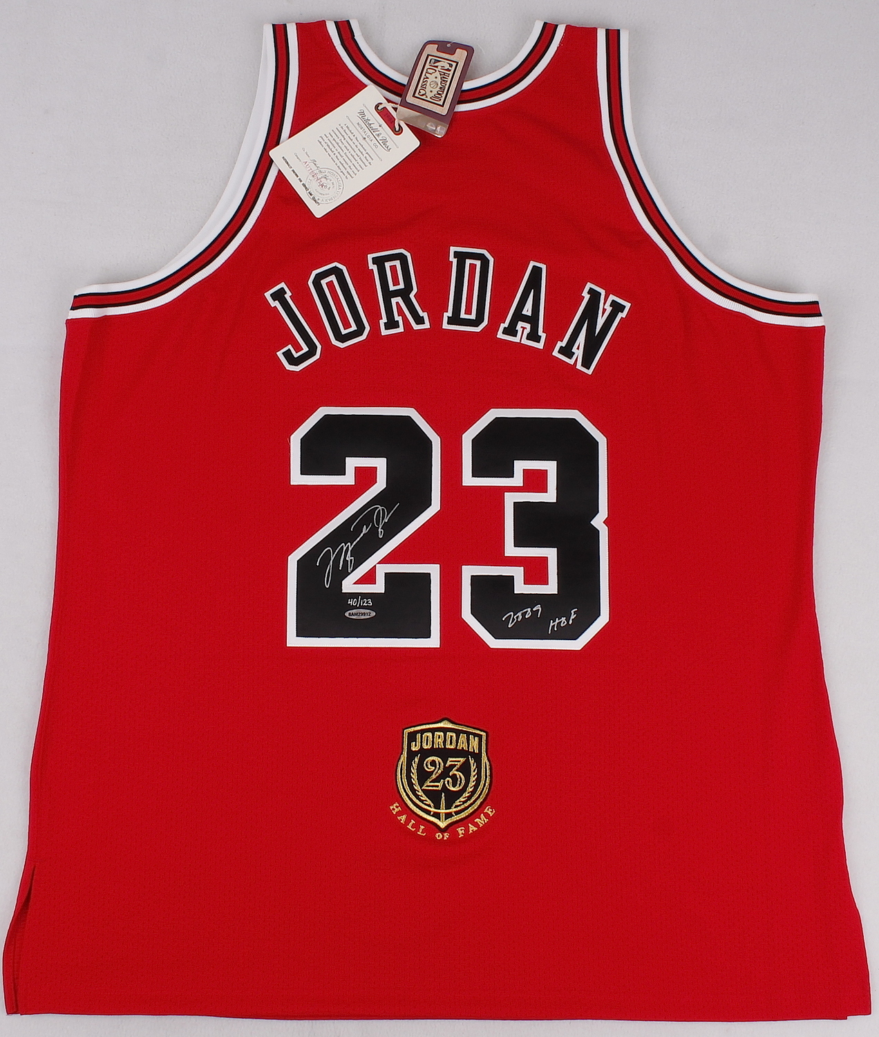 Michael Jordan Signed Limited Edition Authentic Mitchell & Ness "Hall of Fame" Bulls Jersey Inscribed "2009 HOF" #64/123 (UDA COA) at PristineAuction.com Michael Jordan Signed Limited Edition Authentic Mitchell & Ness "Hall of Fame" Bulls Jersey Inscribed "2009 HOF" #64/123 (UDA COA) at PristineAuction.com