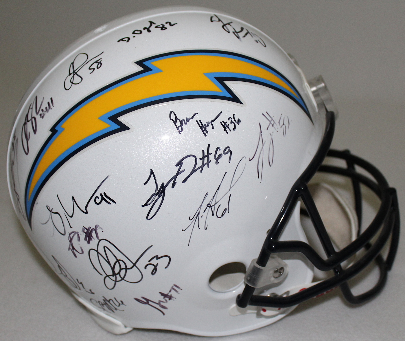 Chargers Full-Size Replica Pro Line Helmet Signed by (29) with Philip Rivers, Vincent Jackson, Darren Sproles, Kassim Osgood (PA LOA) at PristineAuction.com Chargers Full-Size Replica Pro Line Helmet Signed by (29) with Philip Rivers, Vincent Jackson, Darren Sproles, Kassim Osgood (PA LOA) at PristineAuction.com