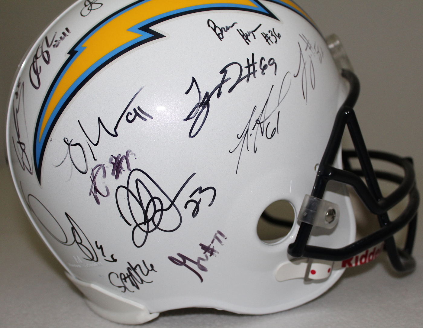 Chargers Full-Size Replica Pro Line Helmet Signed by (29) with Philip Rivers, Vincent Jackson, Darren Sproles, Kassim Osgood (PA LOA) at PristineAuction.com Chargers Full-Size Replica Pro Line Helmet Signed by (29) with Philip Rivers, Vincent Jackson, Darren Sproles, Kassim Osgood (PA LOA) at PristineAuction.com