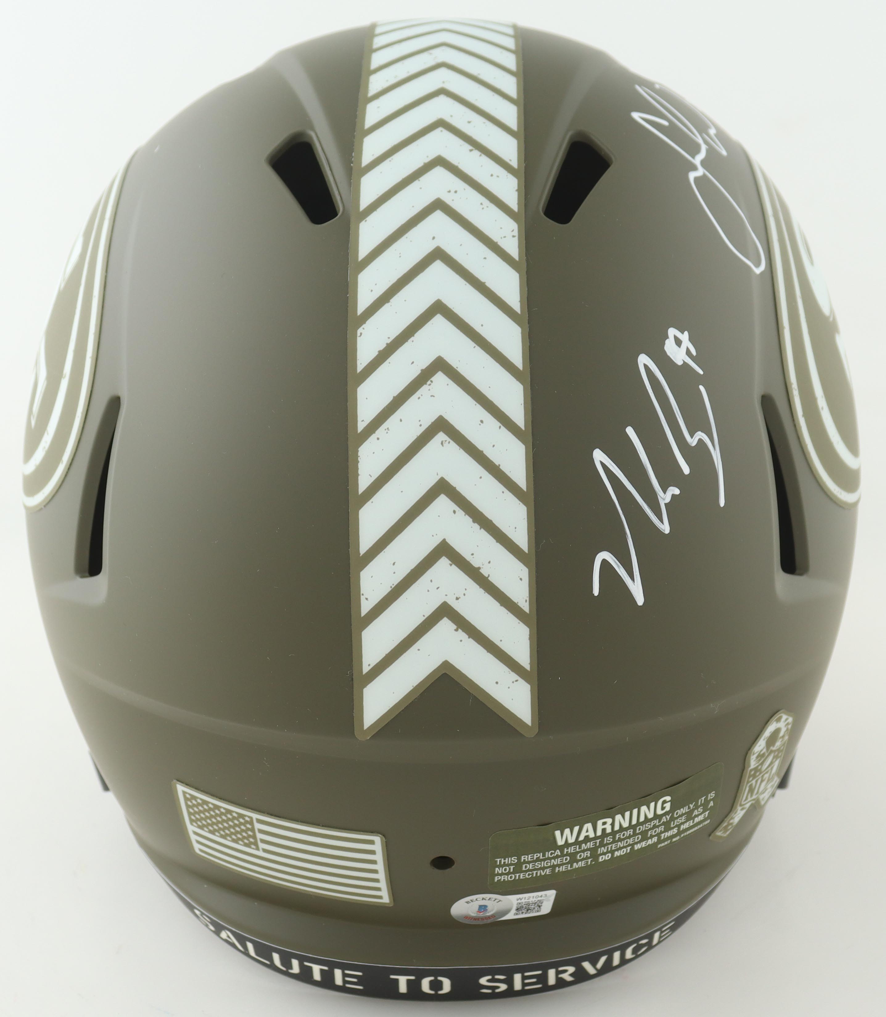 Christian McCaffrey, Nick Bosa and Fred Warner Signed 49ers Full-Size Salute To Service Alternate Speed Helmet (Beckett) at PristineAuction.com Christian McCaffrey, Nick Bosa and Fred Warner Signed 49ers Full-Size Salute To Service Alternate Speed Helmet (Beckett) at PristineAuction.com