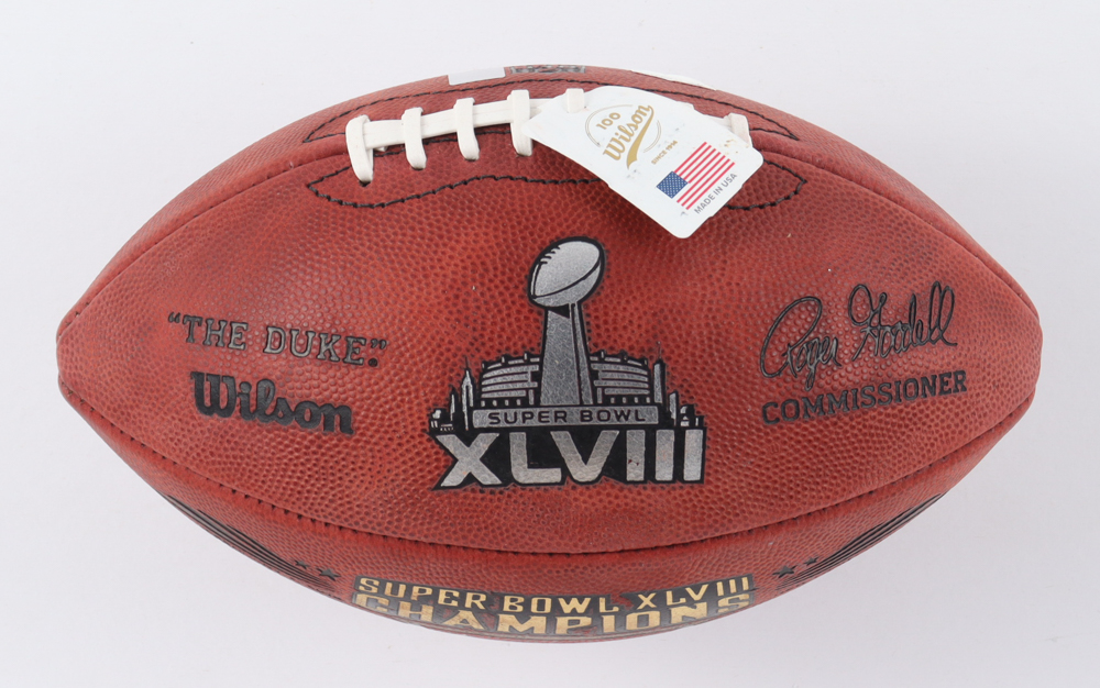Russell Wilson Signed LE "The Duke" Super Bowl XLVIII Logo NFL Football (Beckett) at PristineAuction.com Russell Wilson Signed LE "The Duke" Super Bowl XLVIII Logo NFL Football (Beckett) at PristineAuction.com
