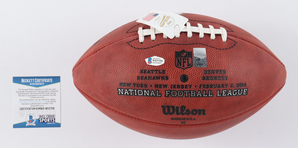 Russell Wilson Signed LE "The Duke" Super Bowl XLVIII Logo NFL Football (Beckett) at PristineAuction.com Russell Wilson Signed LE "The Duke" Super Bowl XLVIII Logo NFL Football (Beckett) at PristineAuction.com