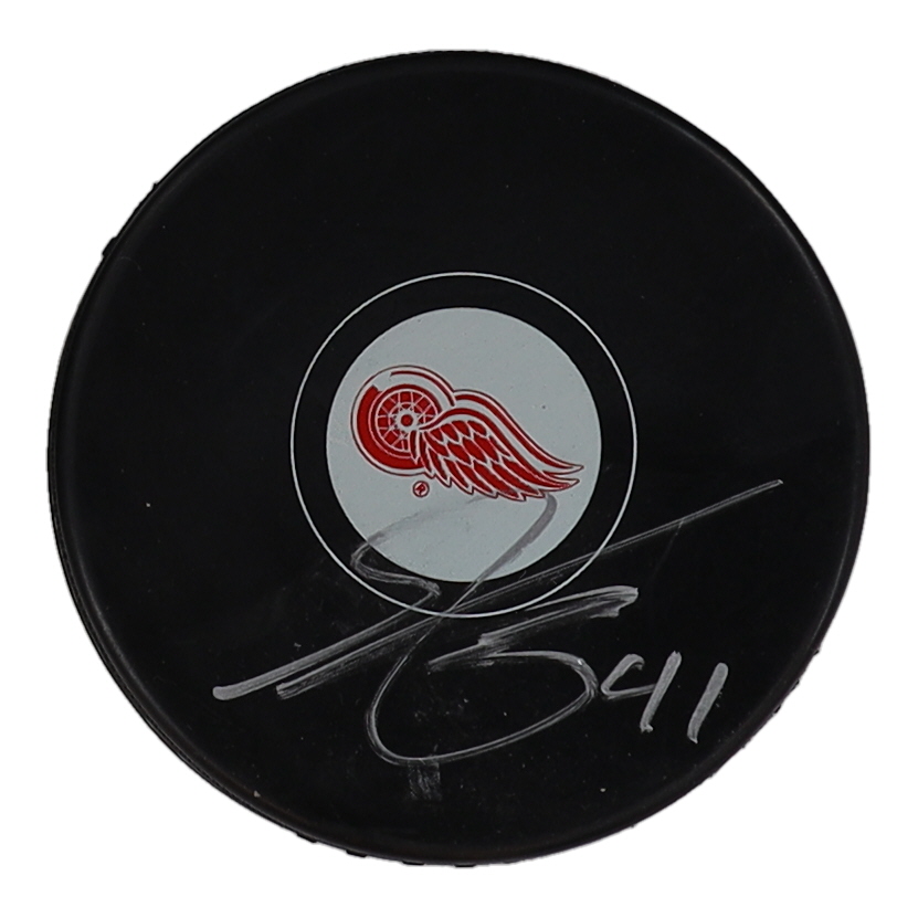 Shayne Gostisbehere Signed Red Wings Logo Hockey Puck (JSA) at PristineAuction.com Shayne Gostisbehere Signed Red Wings Logo Hockey Puck (JSA) at PristineAuction.com