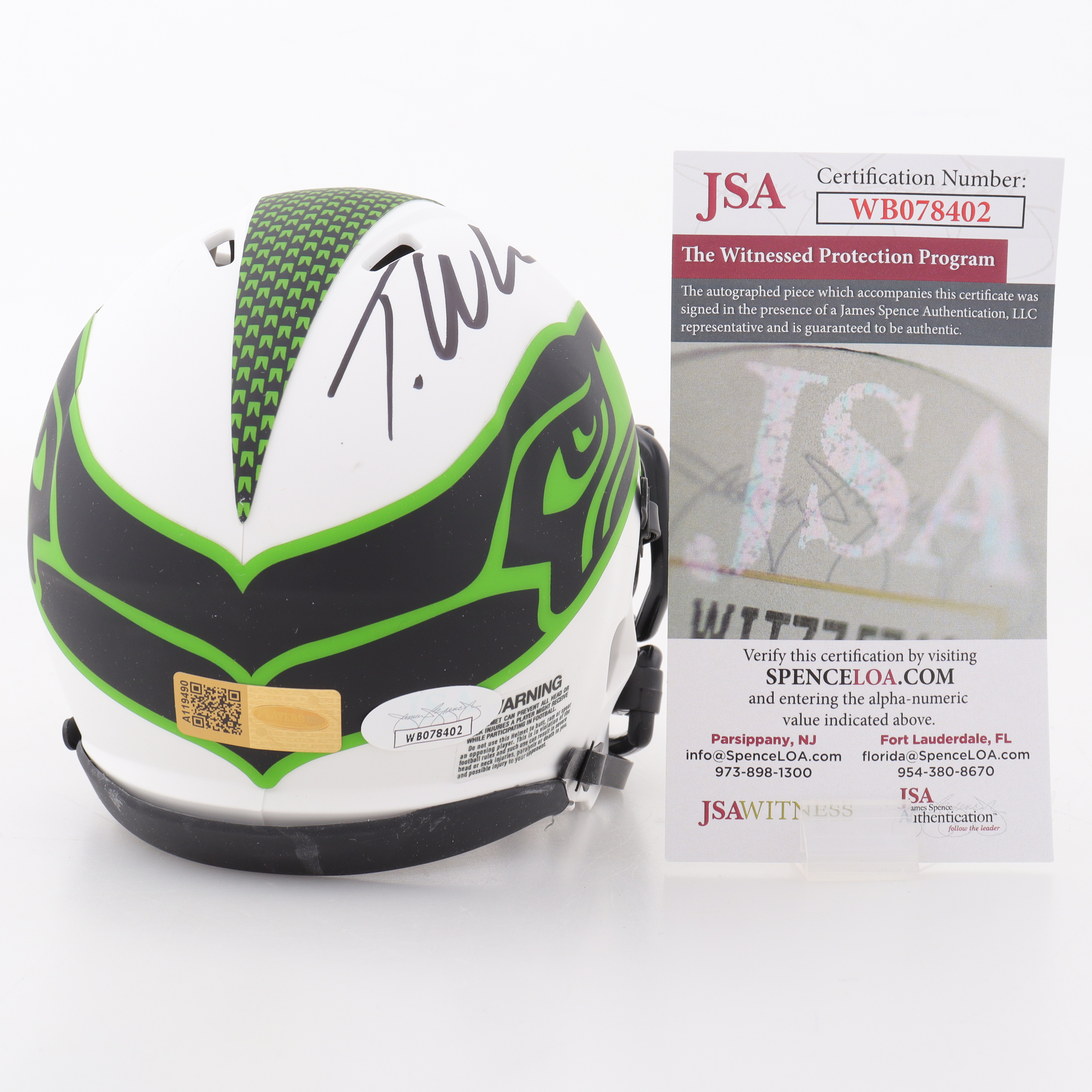 Tariq Woolen Signed Seahawks Lunar Eclipse Alternate Speed Mini Helmet (JSA & Players Ink) at PristineAuction.com Tariq Woolen Signed Seahawks Lunar Eclipse Alternate Speed Mini Helmet (JSA & Players Ink) at PristineAuction.com