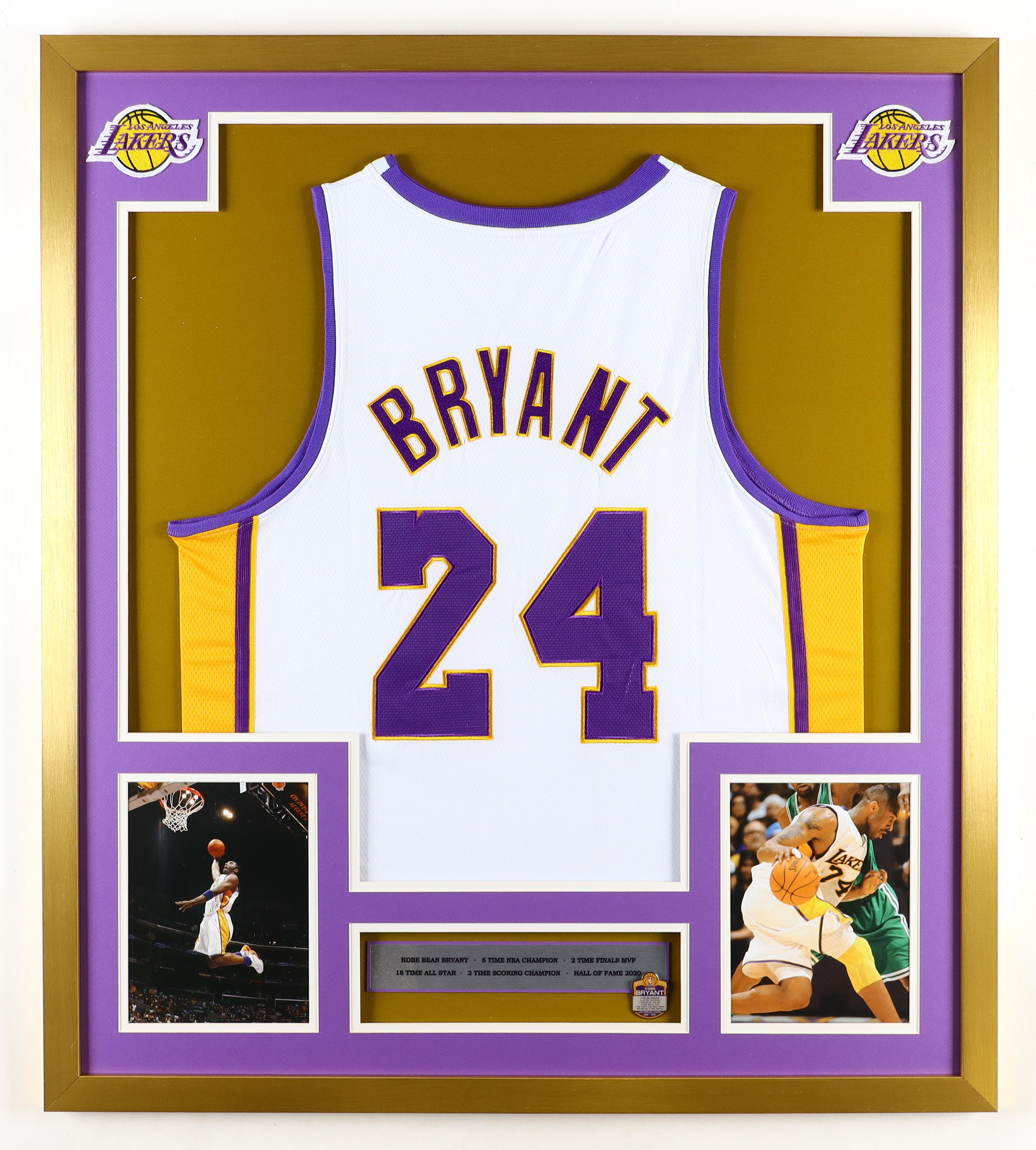 Kobe Bryant Custom Framed Jersey Display With Player Career Stats Pin & (2) Cloth Team Logo Patches at PristineAuction.com Kobe Bryant Custom Framed Jersey Display With Player Career Stats Pin & (2) Cloth Team Logo Patches at PristineAuction.com