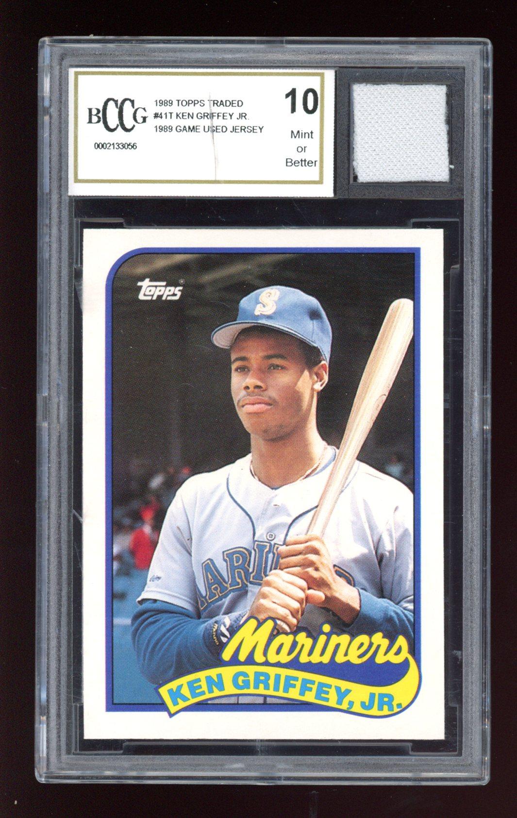 Ken Griffey Jr. 1989 Topps Traded #41T RC with Piece of 1989 Game-Used Jersey (BCCG 10) at PristineAuction.com Ken Griffey Jr. 1989 Topps Traded #41T RC with Piece of 1989 Game-Used Jersey (BCCG 10) at PristineAuction.com