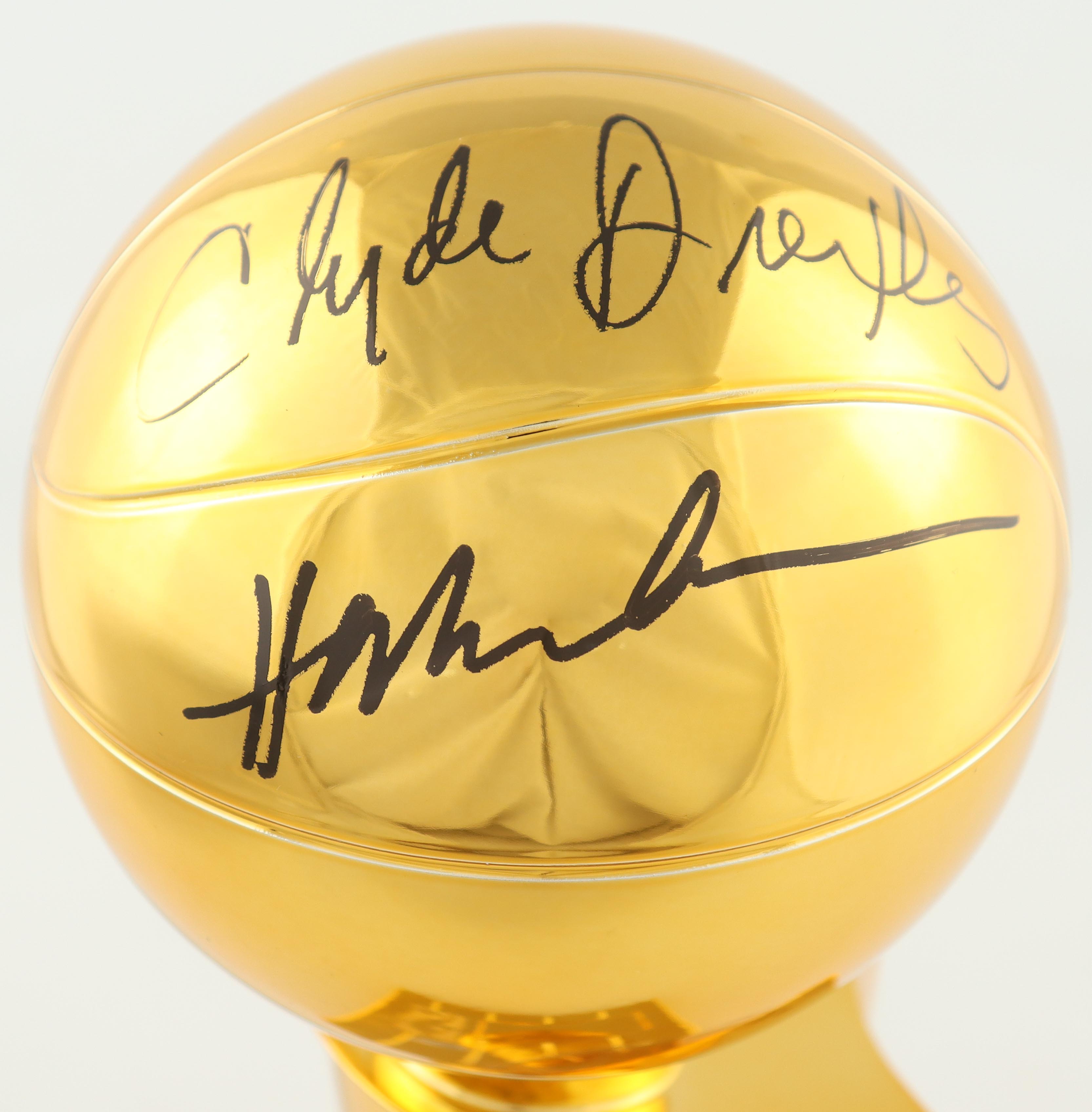 Clyde Drexler & Hakeem Olajuwon Signed Rockets NBA Champions 12" Replica Trophy (Fanatics) at PristineAuction.com Clyde Drexler & Hakeem Olajuwon Signed Rockets NBA Champions 12" Replica Trophy (Fanatics) at PristineAuction.com