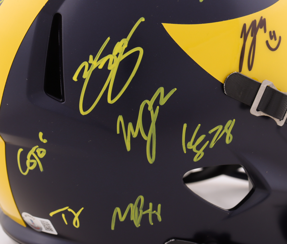 2023 Michigan Wolverines Full-Size Speed Helmet Team-Signed by (19) with J.J. McCarthy, Blake Corum, Roman Wilson, Colston Loveland (Beckett) at PristineAuction.com 2023 Michigan Wolverines Full-Size Speed Helmet Team-Signed by (19) with J.J. McCarthy, Blake Corum, Roman Wilson, Colston Loveland (Beckett) at PristineAuction.com