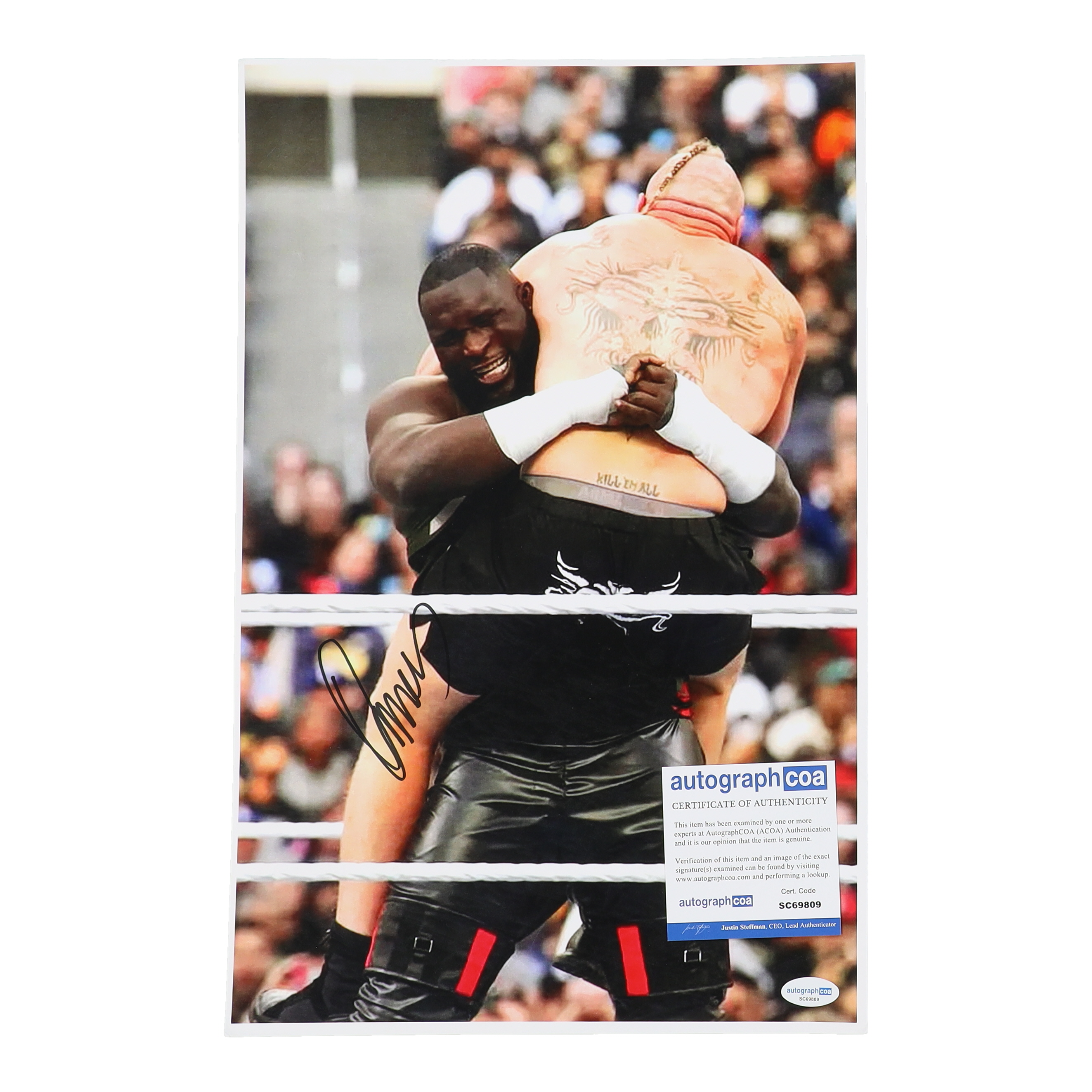 Omos Signed WWE 11x17 Photo (ACOA) at PristineAuction.com Omos Signed WWE 11x17 Photo (ACOA) at PristineAuction.com