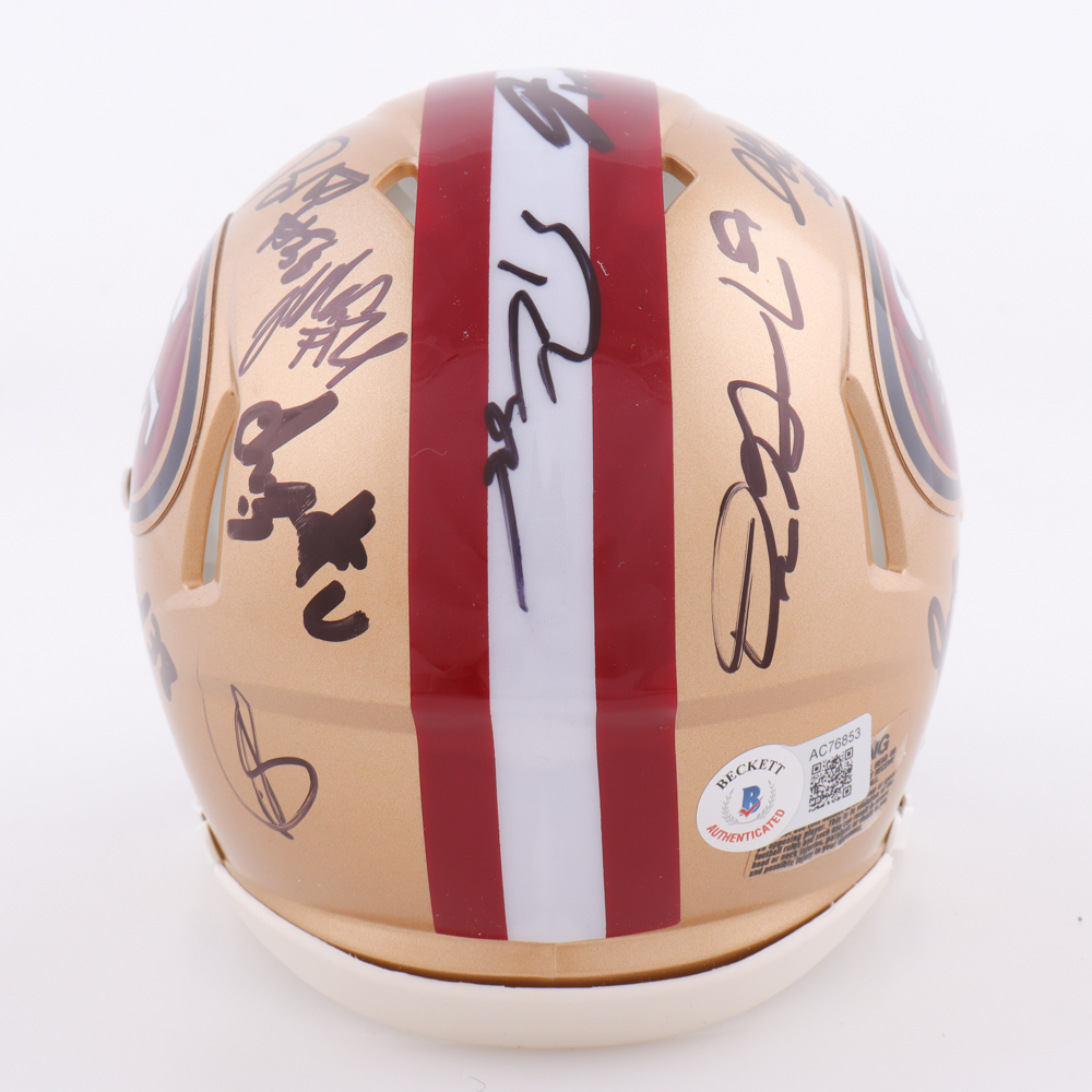 2023-24 49ers Speed Mini Helmet Signed by (13) With Christian McCaffrey, Deebo Samuel, George Kittle, Dre Greenlaw, (Beckett) at PristineAuction.com 2023-24 49ers Speed Mini Helmet Signed by (13) With Christian McCaffrey, Deebo Samuel, George Kittle, Dre Greenlaw, (Beckett) at PristineAuction.com